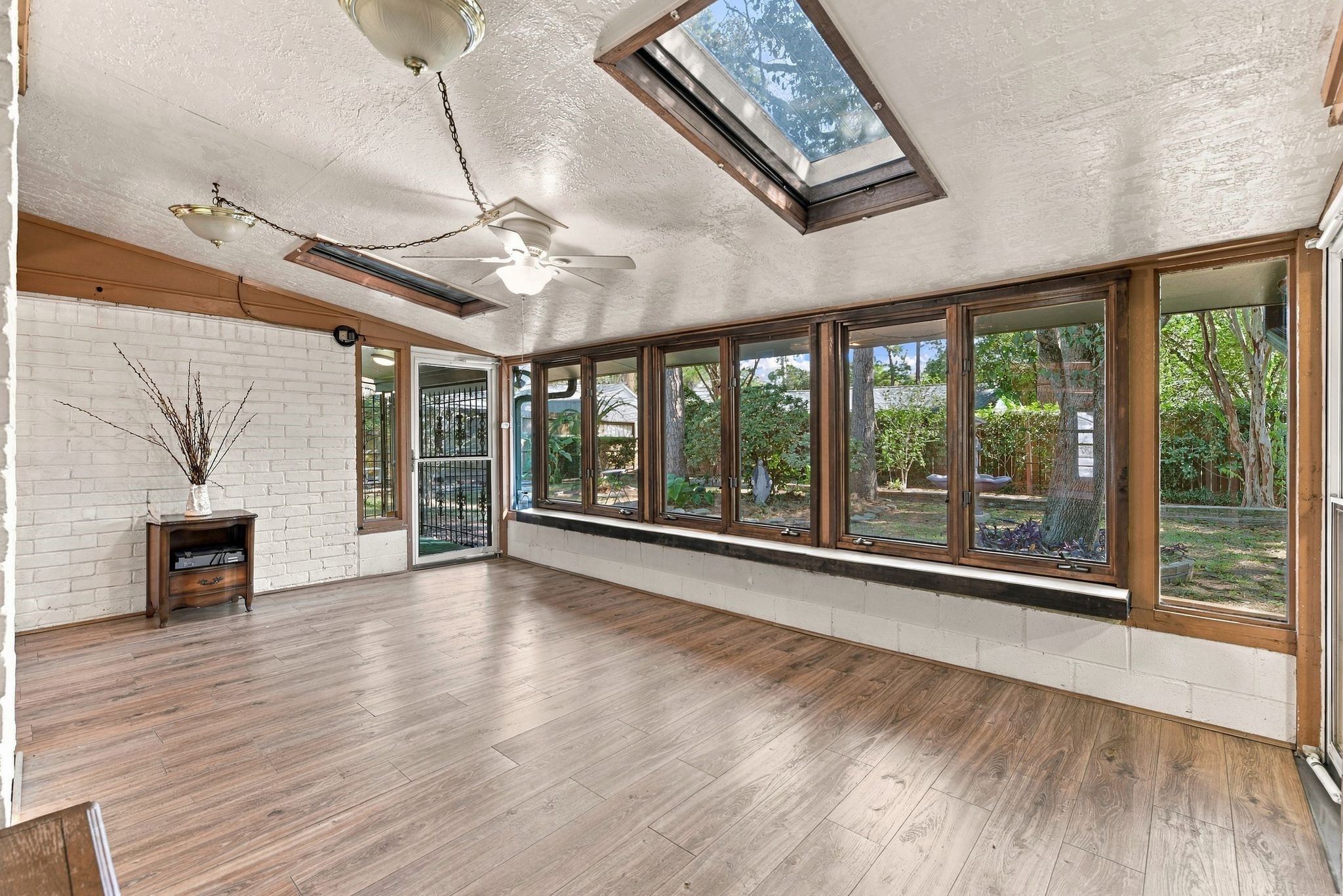 Cozy sunroom! It is heated and cooled. Perfect for entertaining!