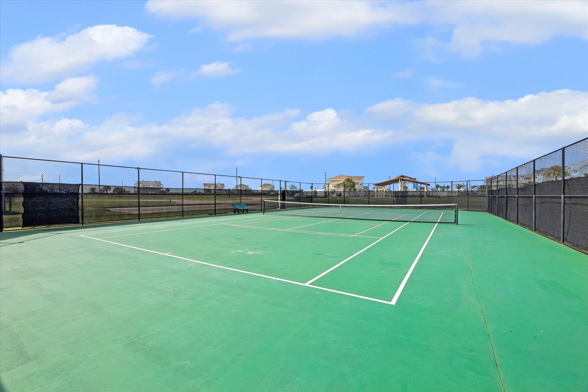 The community tennis court adds another outdoor amenity within Sunset Cove, offering space to play without leaving the neighborhood. A nice bonus for weekend guests, family time, or an active coastal lifestyle.