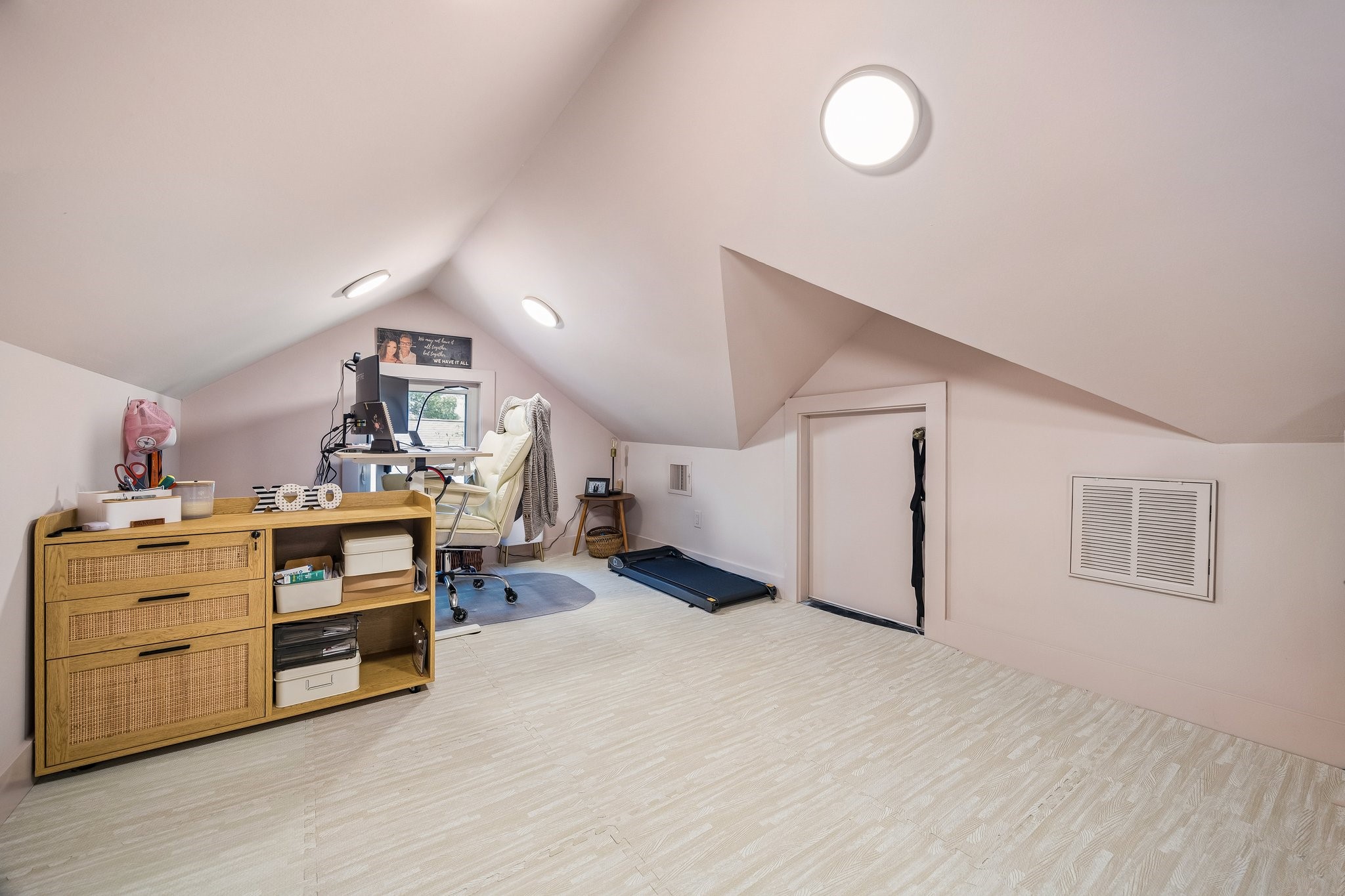 The attic is portrayed as both an office and a quiet room.