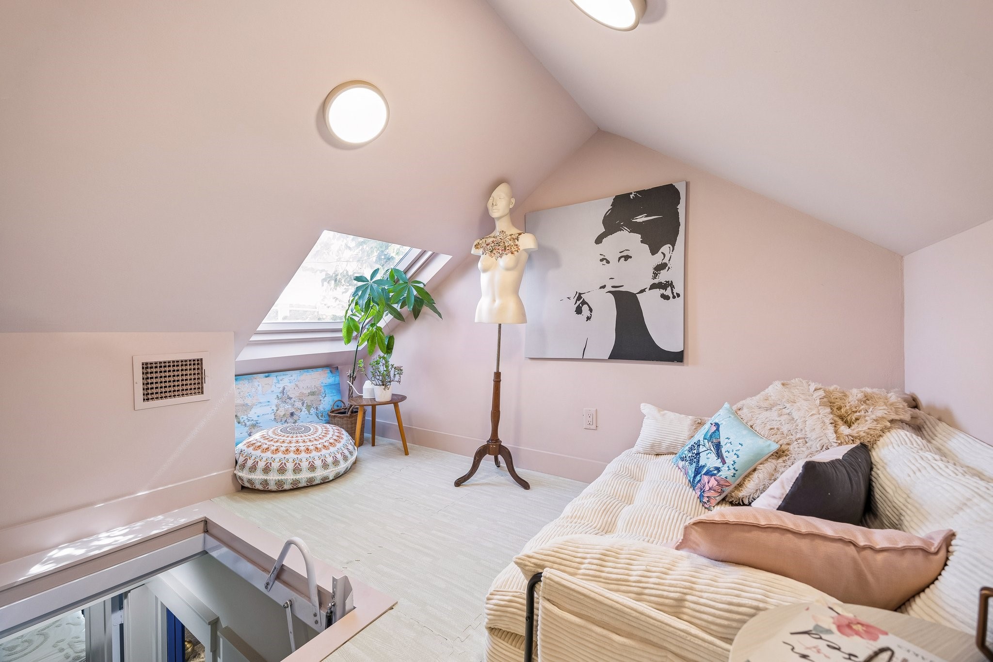 The attic was transformed into a playroom/office. Possibilities are endless.