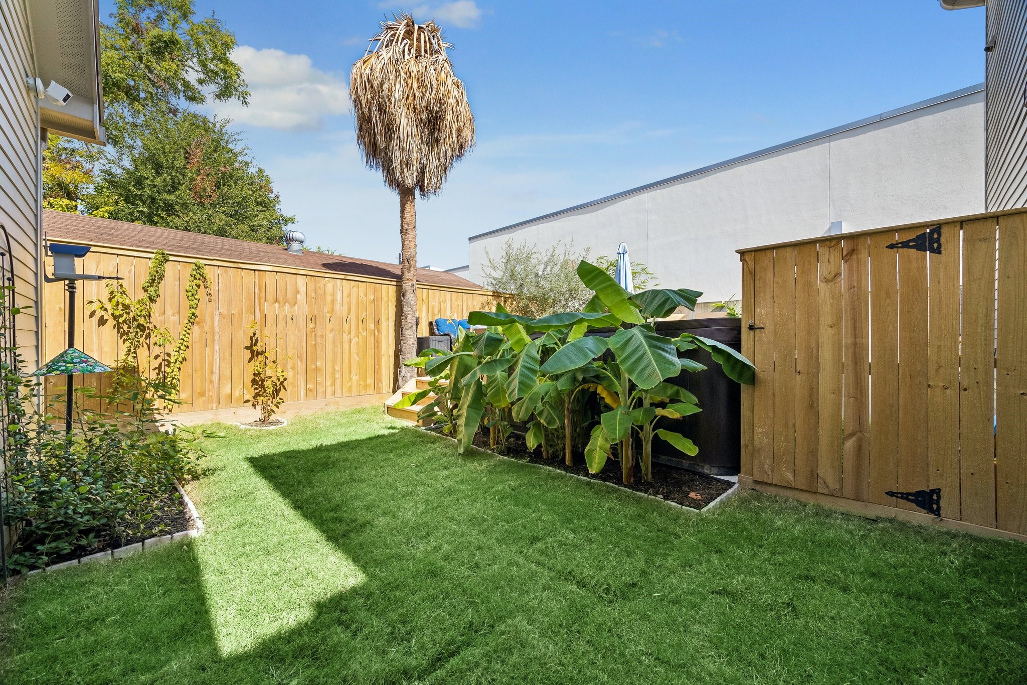 Spacious backyard with a new deck for pool and seating