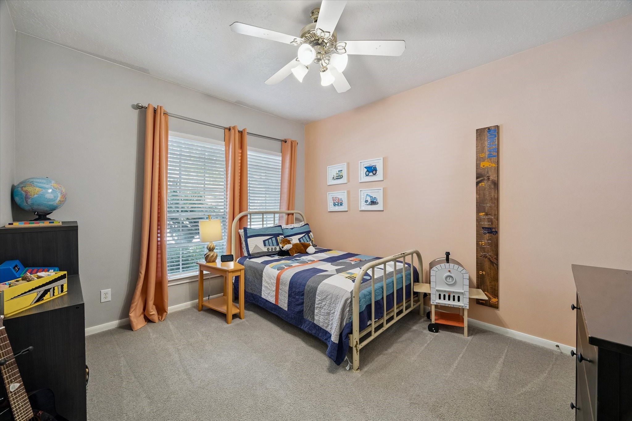 This bedroom provides a walk-in closet.