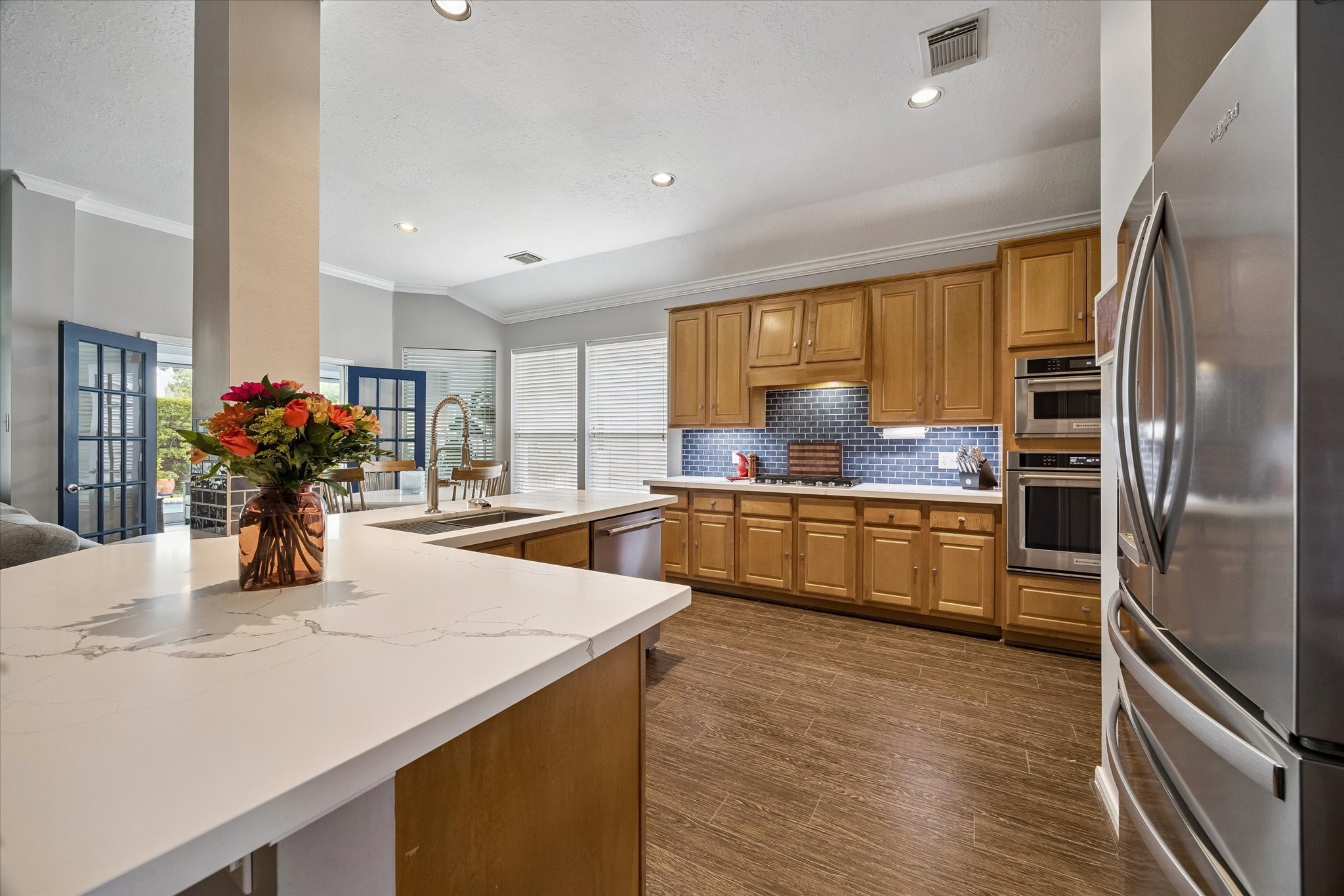 The kitchen offers plenty of storage, prep and cooking space.