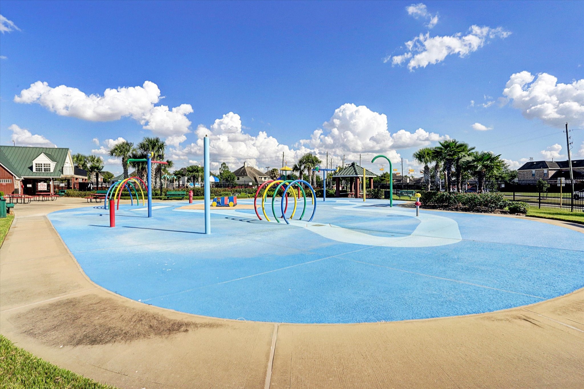 Amenities include pools, splash pad, tennis courts, club house, fitness center, playgrounds and basketball courts.