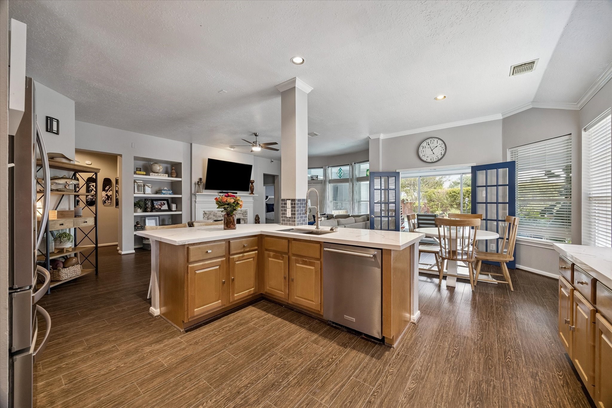 The kitchen offers KitchenAid stainless steel appliances and a deep sink making cleaning pots and pans a breeze.