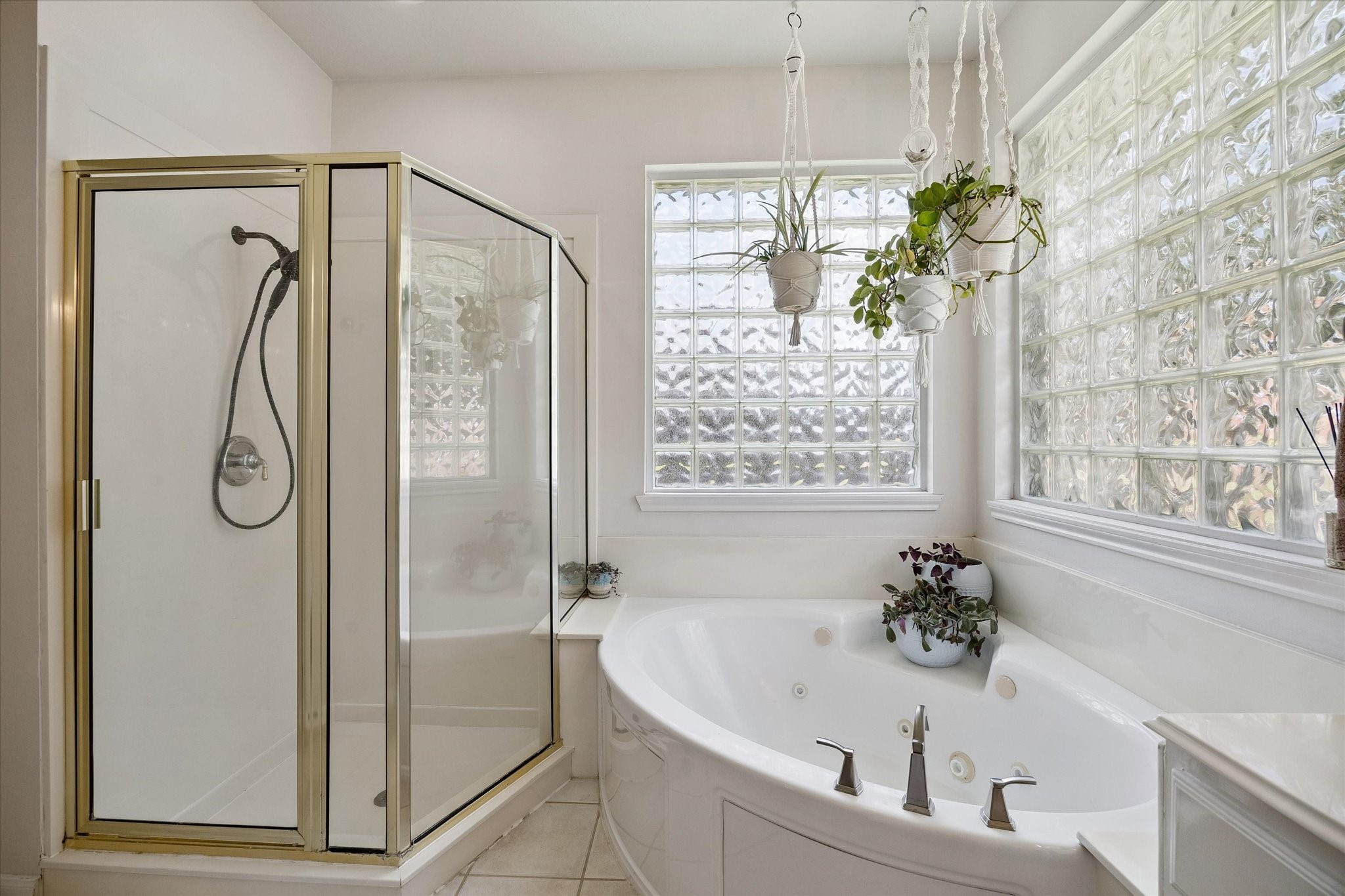 Another view of the primary en-suite bath and all the natural light.