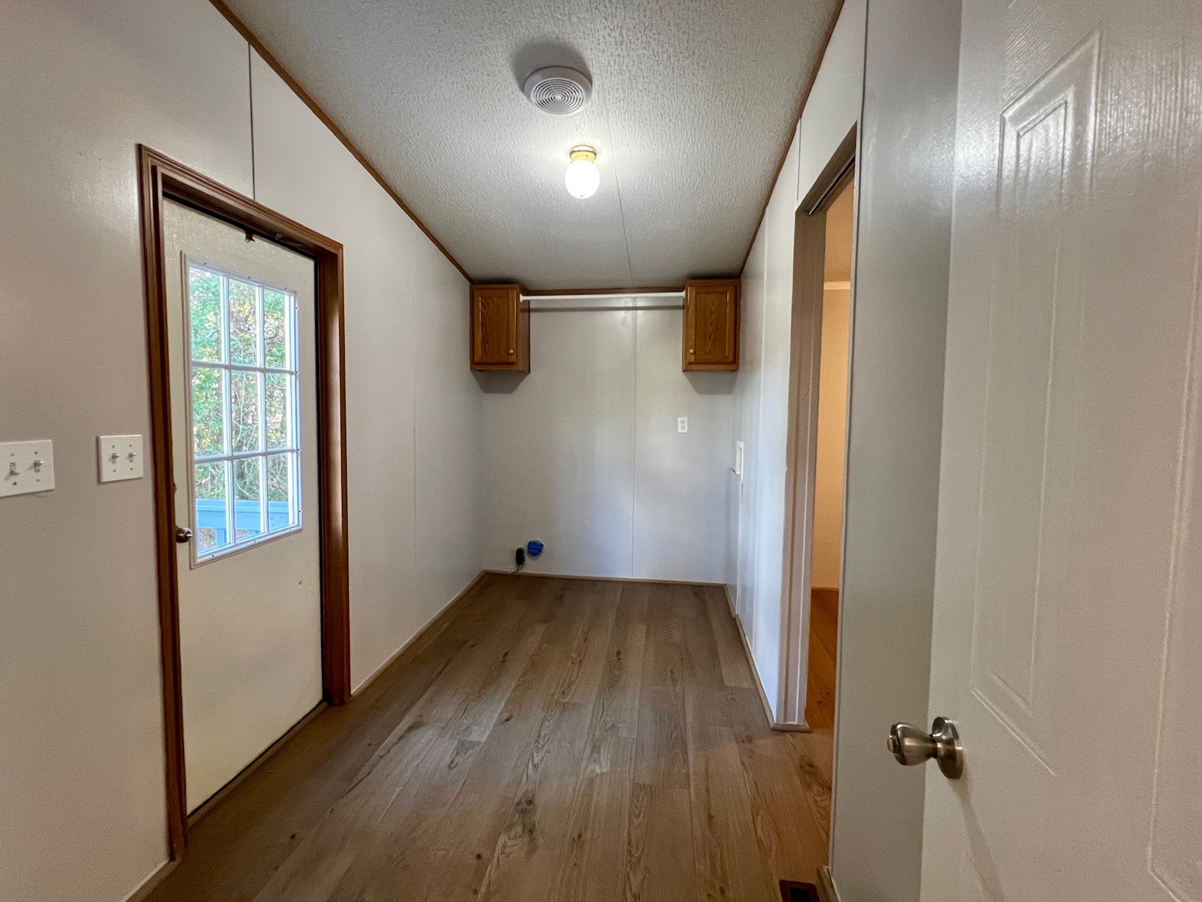 Laundry room with electric washer & electric dryer connections.