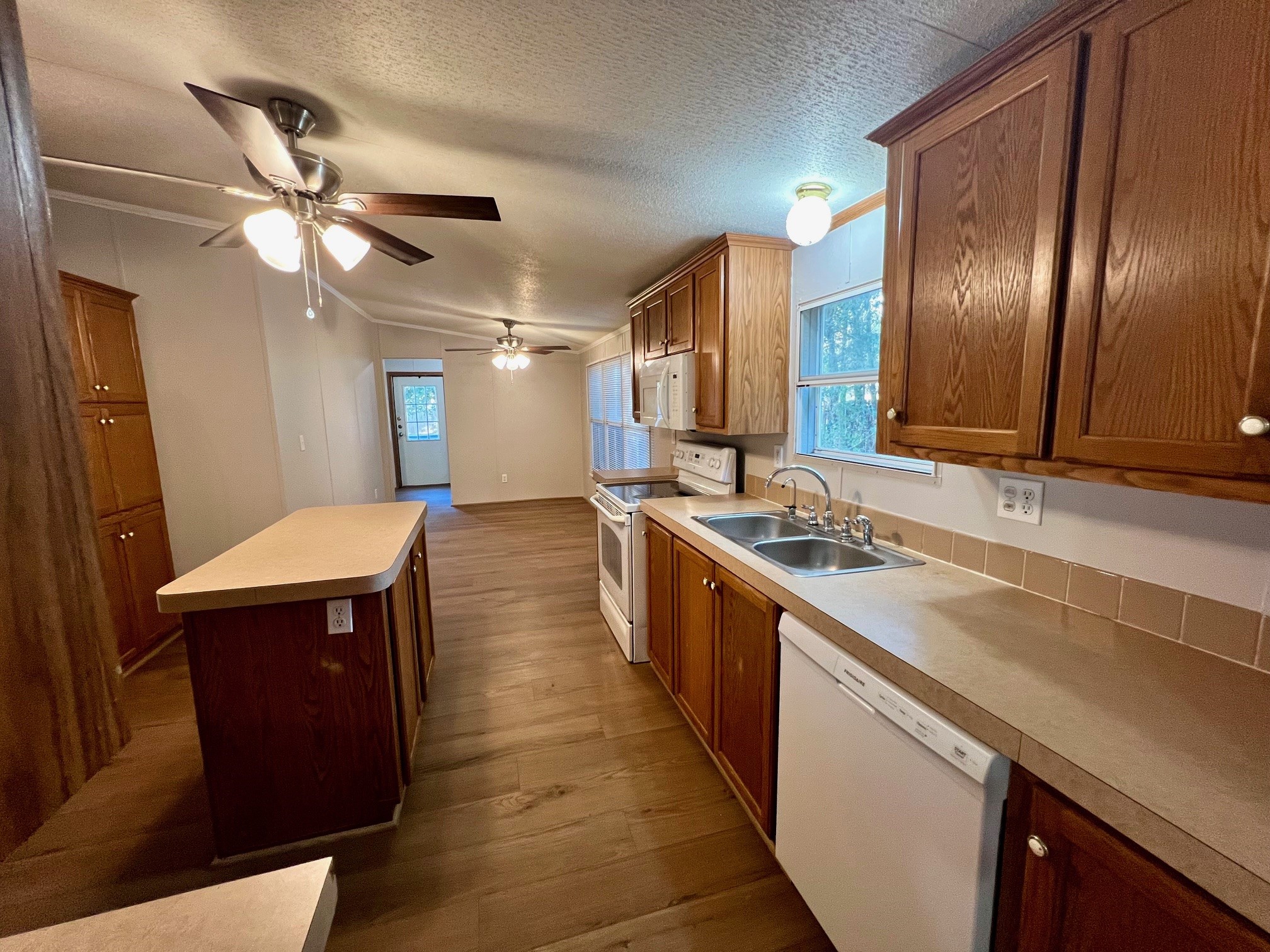 Kitchen with new dishwasher.