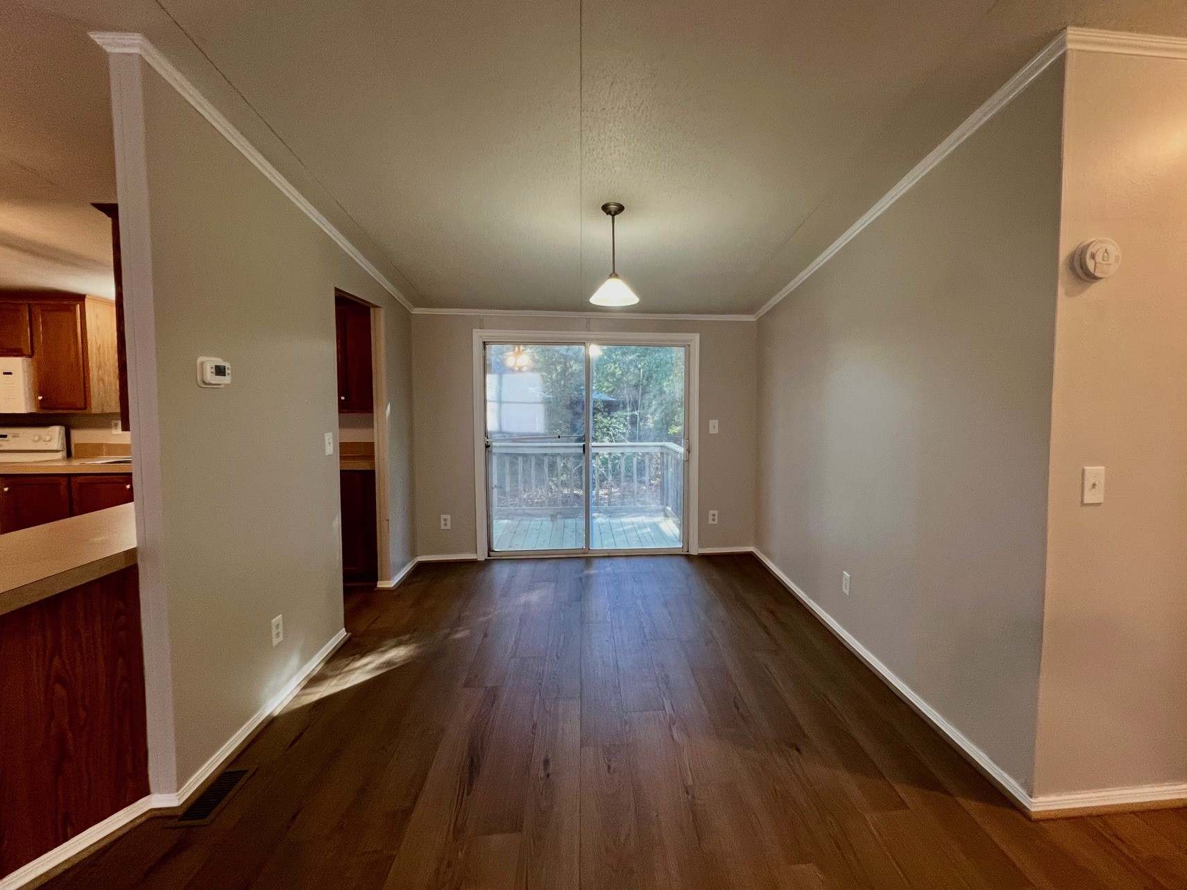 Dining room opens to back deck.