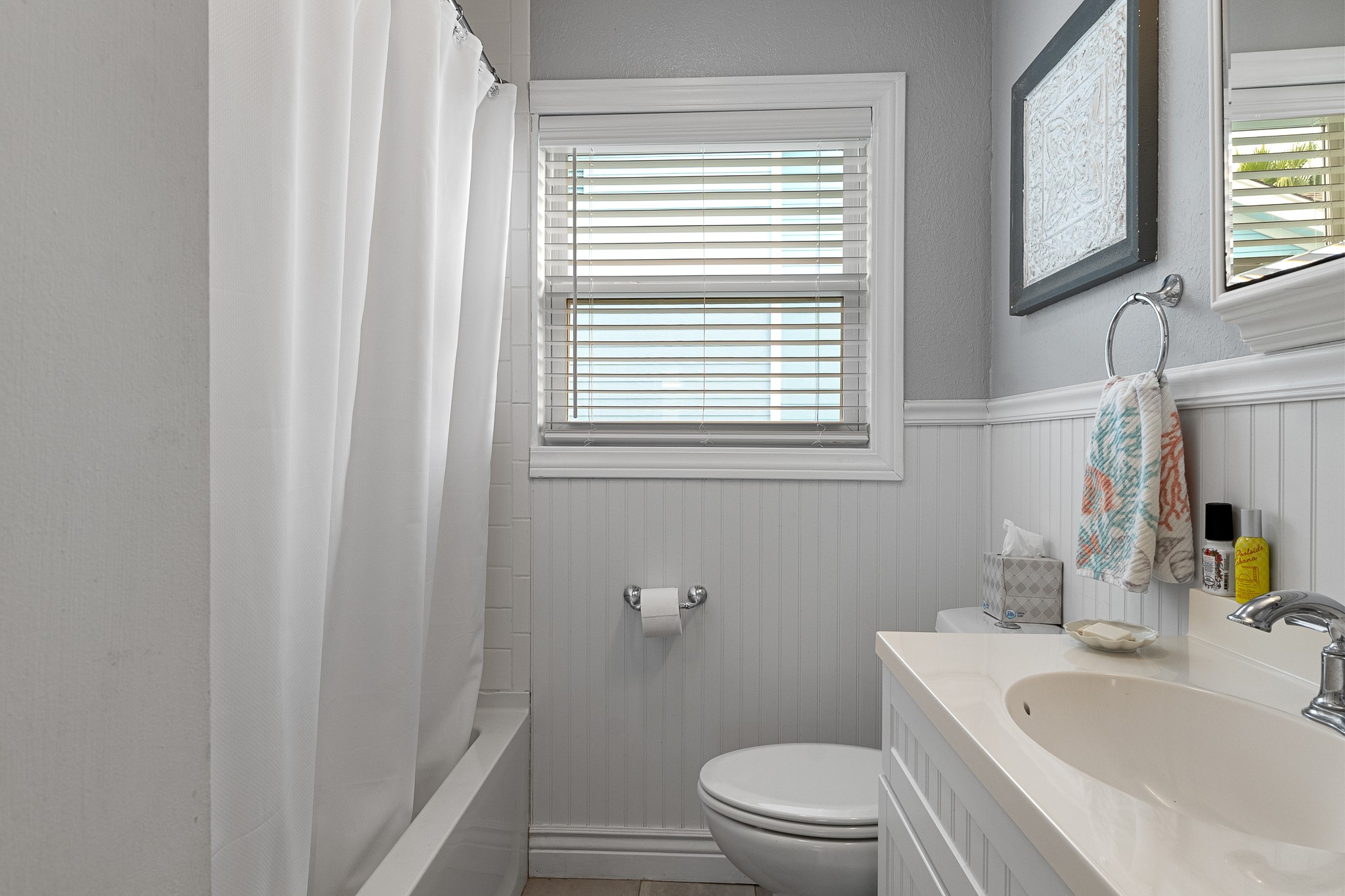 Full bathroom with tub/shower combination and