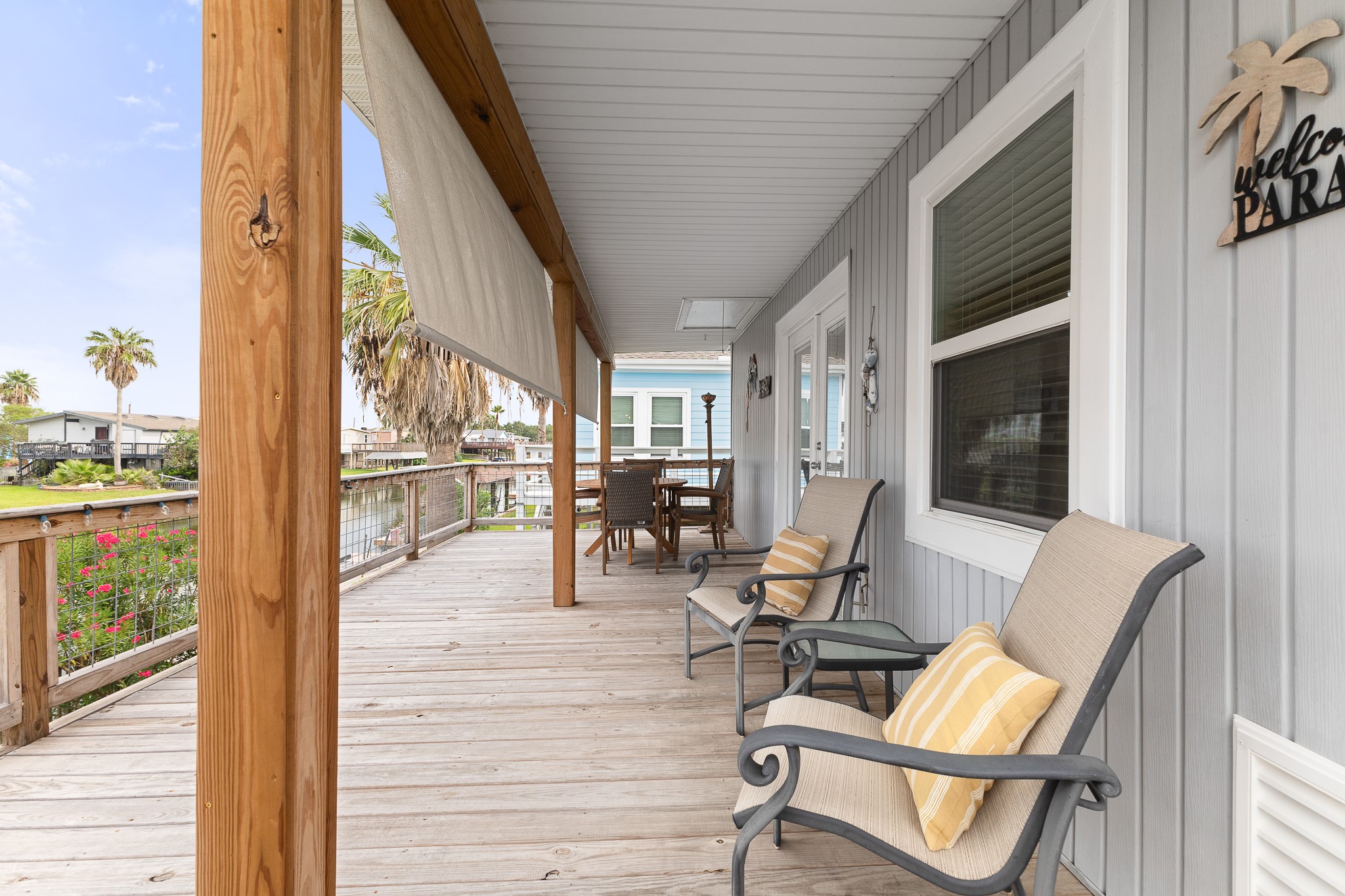 Spacious covered waterfront deck with plenty of room to relax and enjoy canal views. Spacious covered waterfront deck with plenty of room to relax and enjoy canal views.