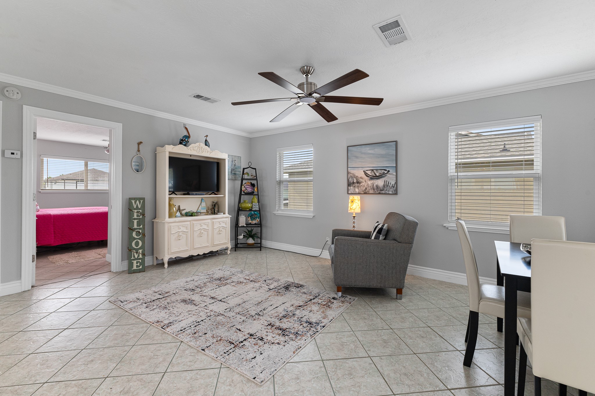 Bright, open living and dining area with easy-care tile flooring. Bright, open living and dining area with easy-care tile flooring.