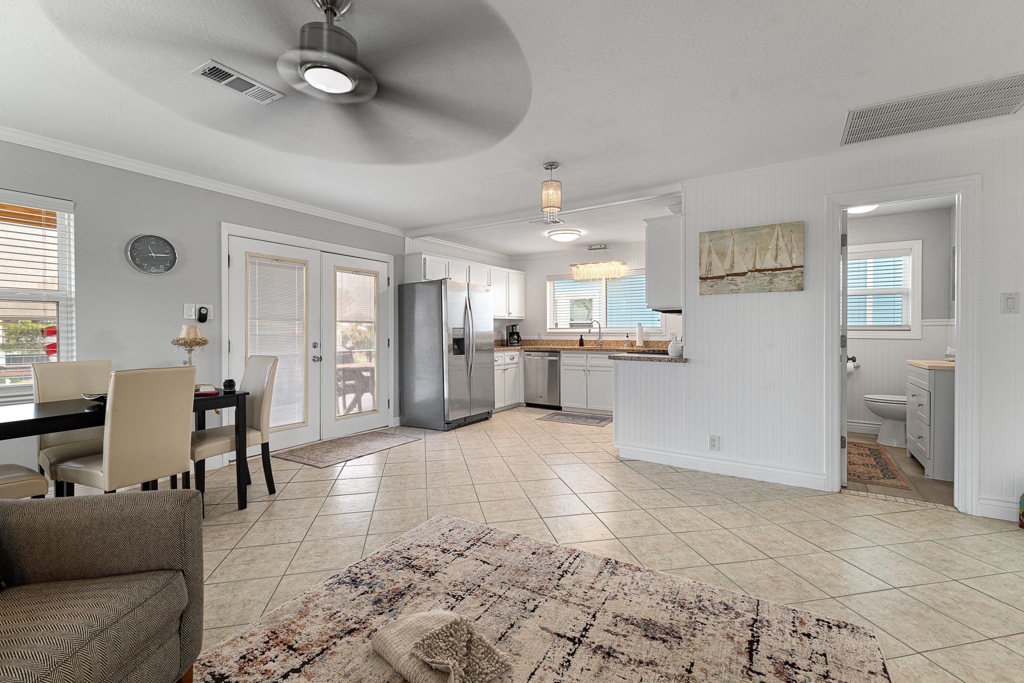 Open-concept view connecting the kitchen, dining and living spaces for easy entertaining. Open-concept view connecting the kitchen, dining and living spaces for easy entertaining.