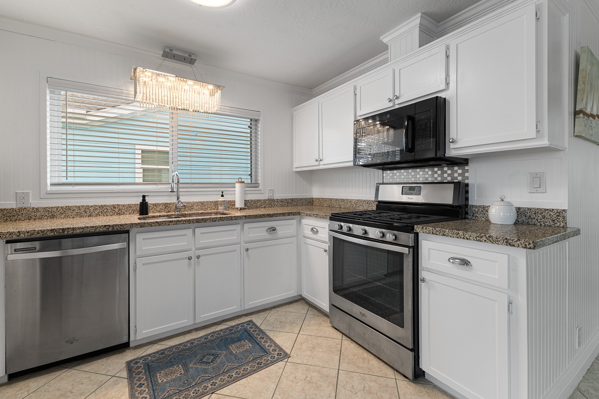 Well-appointed kitchen with gas range, stainless appliances and generous counter space. Well-appointed kitchen with gas range, stainless appliances and generous counter space.