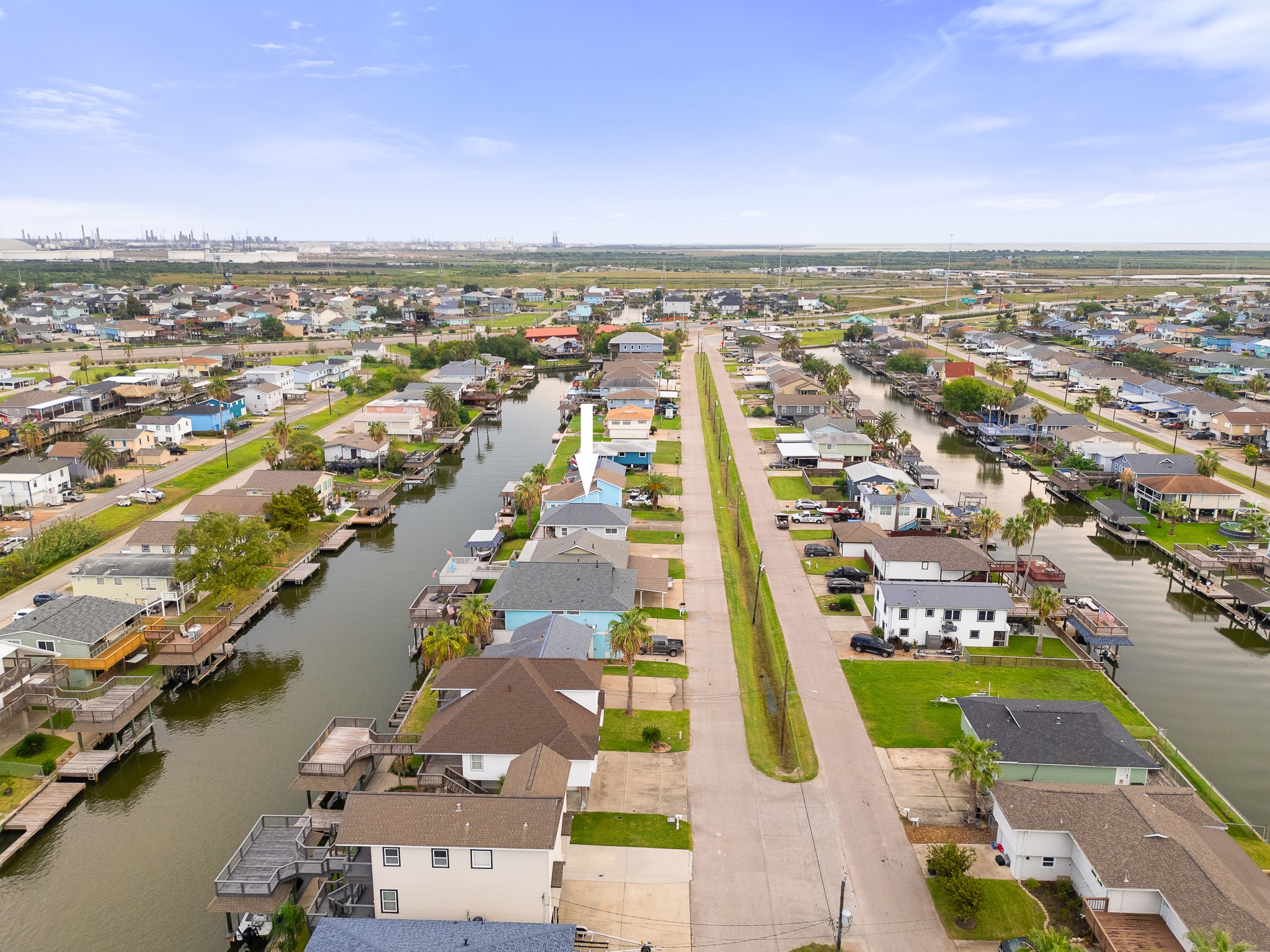 Aerial view highlighting the homes position along the canal.