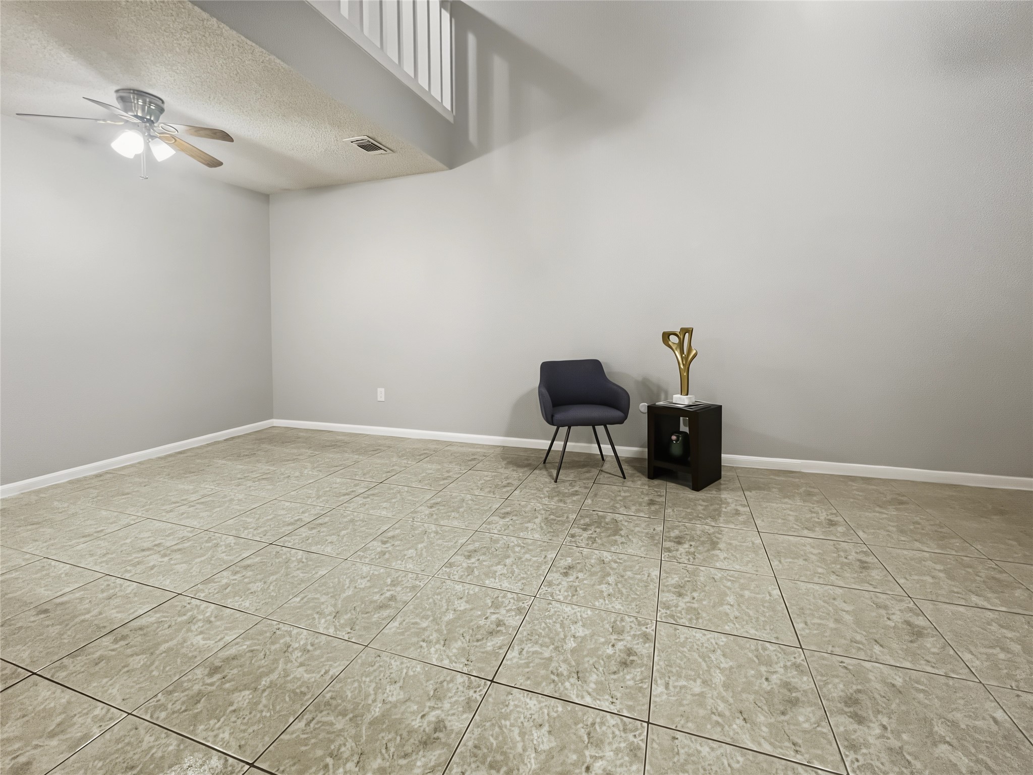 View from the kitchen to the living and dining room spaces.