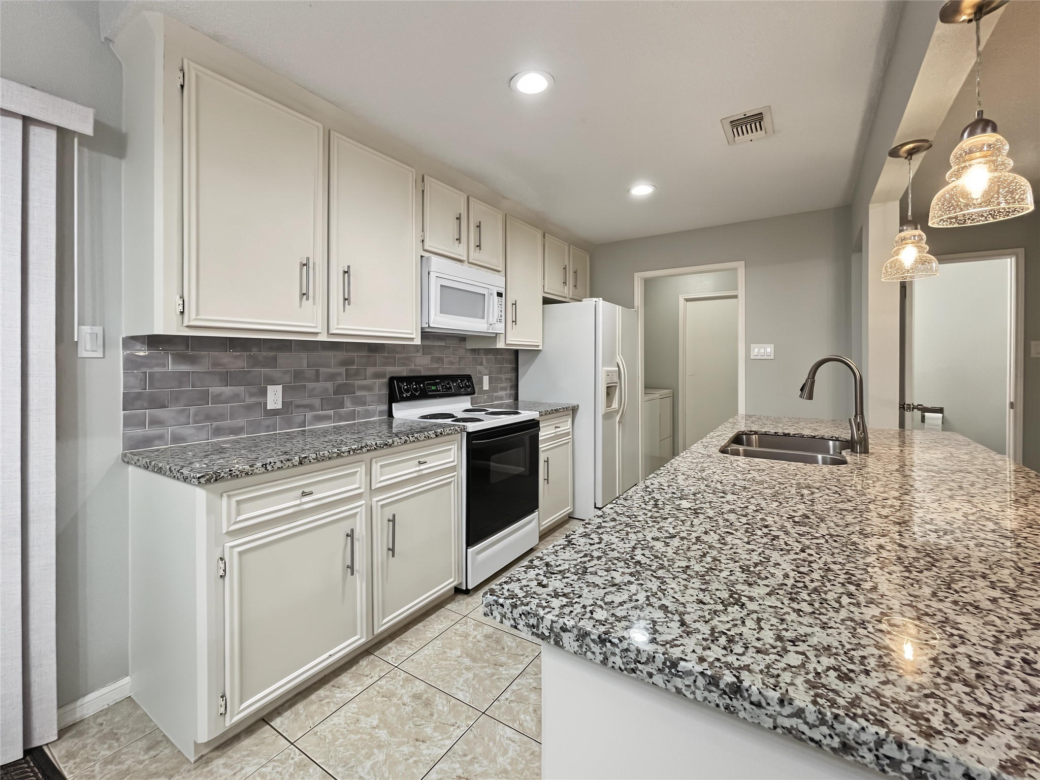 Another view of the kitchen