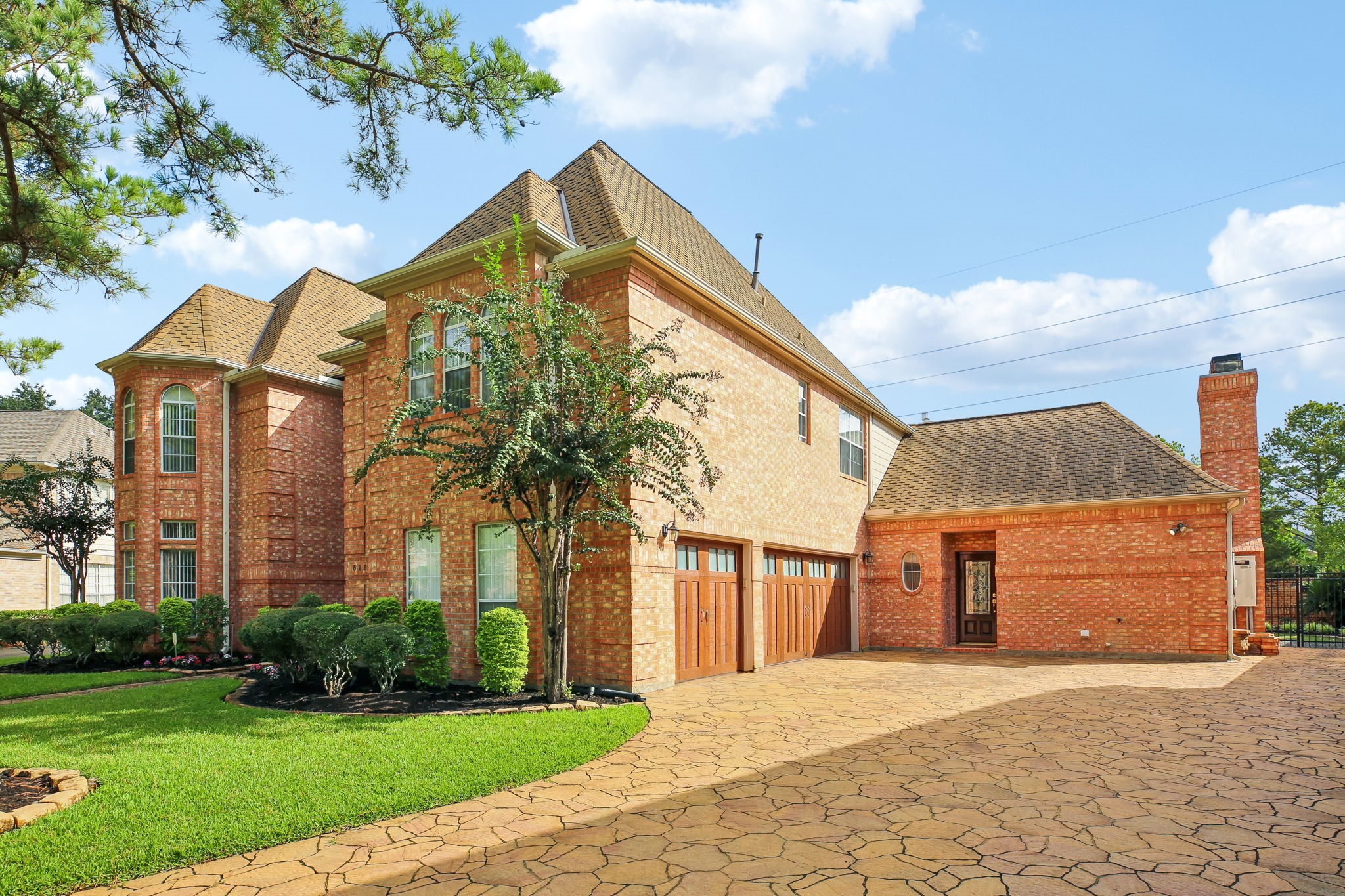 A 3-car garage with ample space and epoxy flooring!