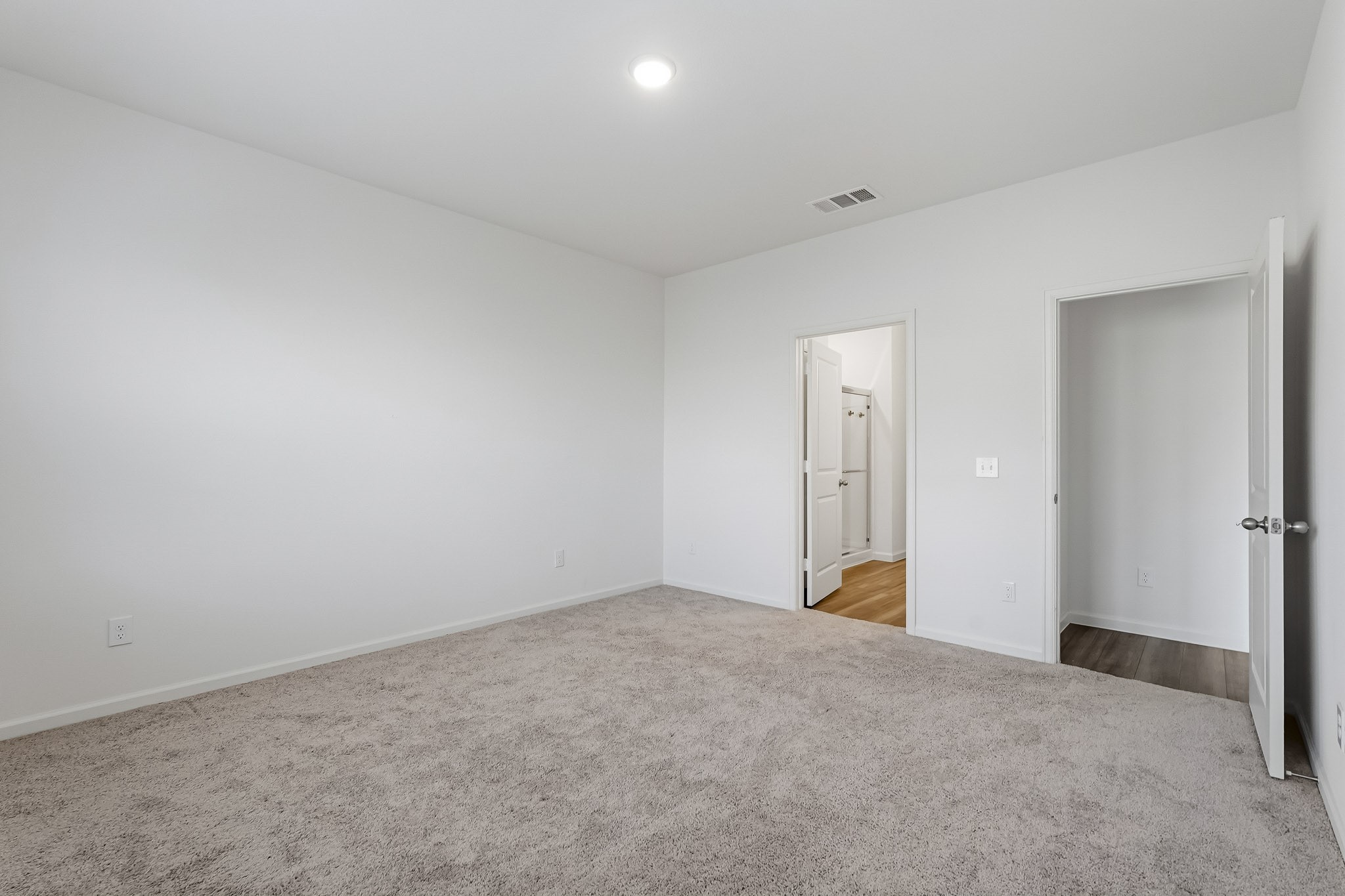 A standout feature is the private primary ensuite bathroom, offering convenient direct access from the bedroom for added comfort and privacy.