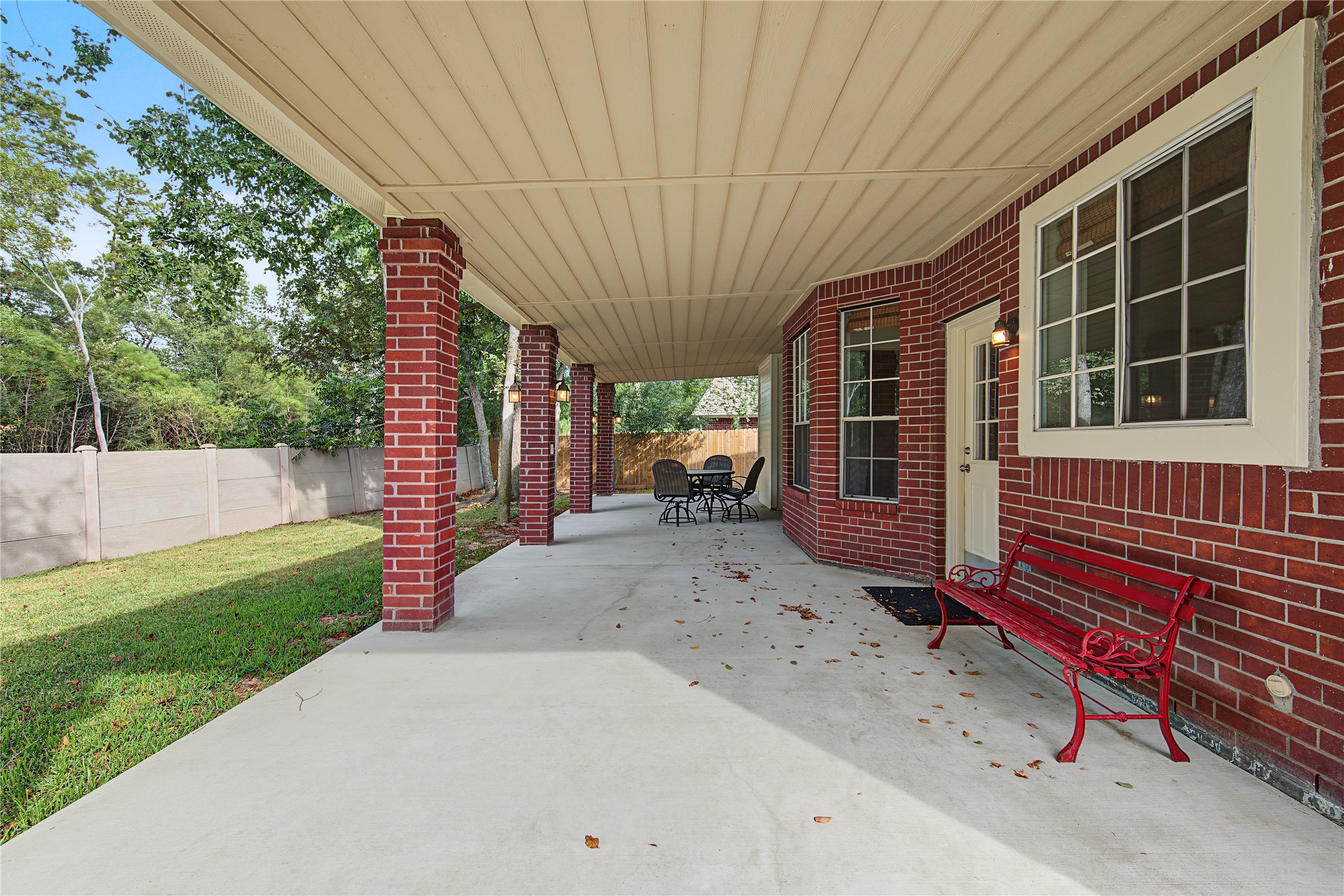 Newly poured 41' x 14' covered patio spans the length of the home, offering plenty of room to relax, dine, and entertain.