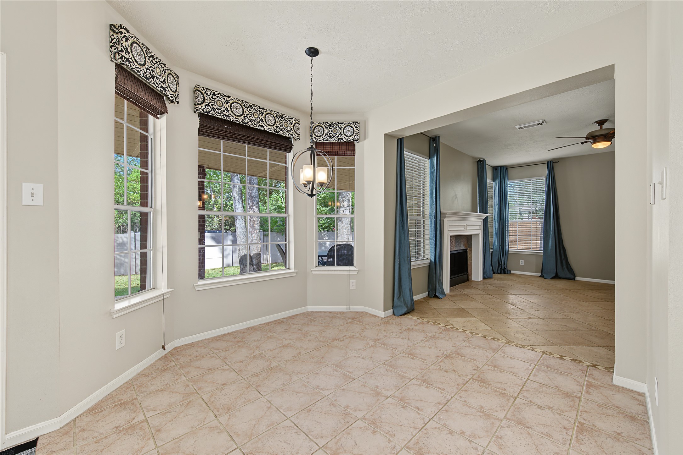 Breakfast area with a sunny bay window