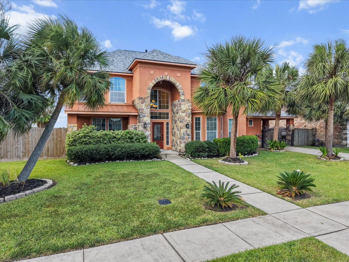 Listen to the palm fronds rustle in the gentle bay breeze of this extraordinary home built with so many thoughtful upgrade and extras. Your personal paradise home awaits!