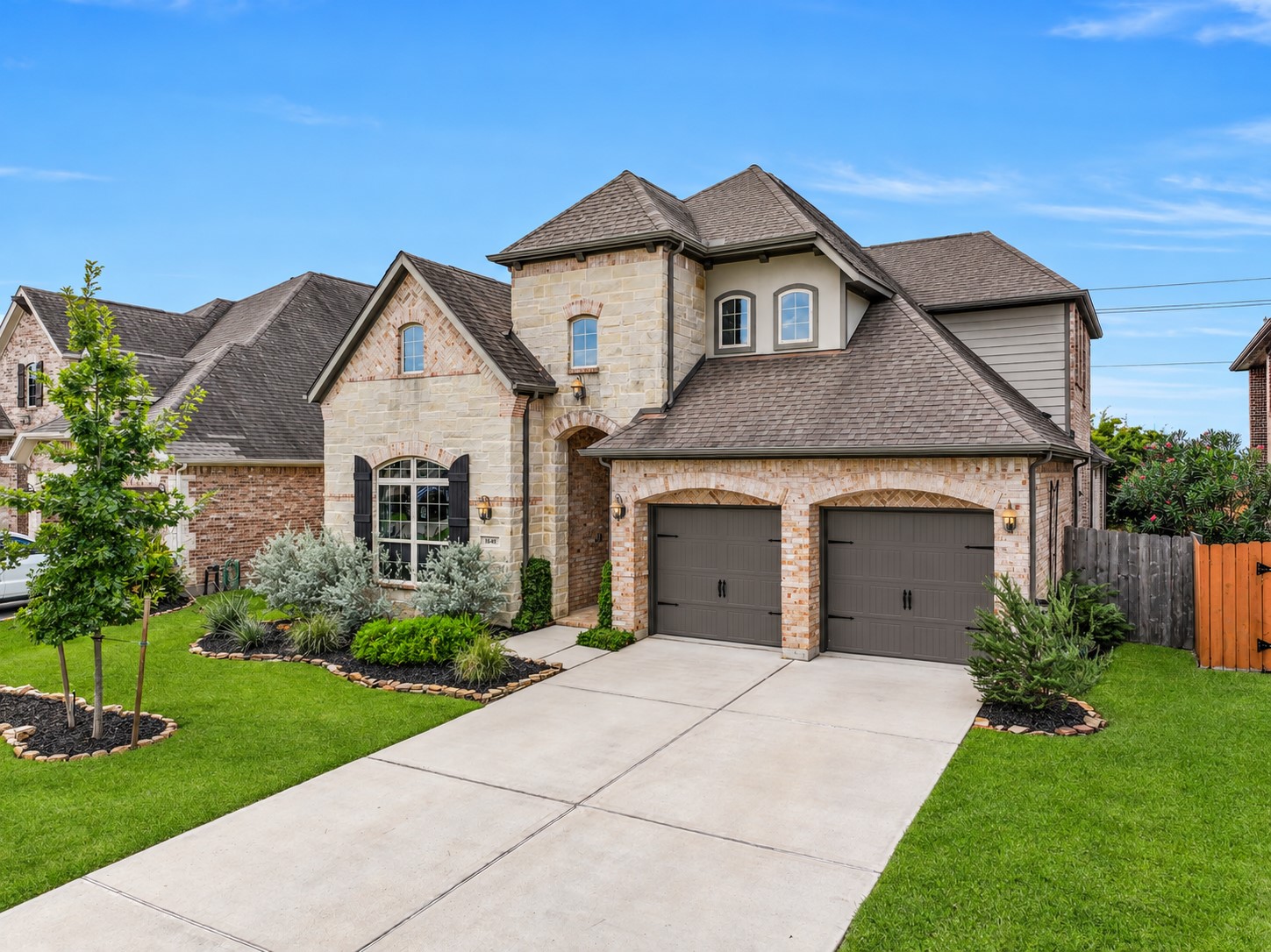 Welcome to 1640 Longwood Glen in West Ranch! This beautiful Village Builders home combines Austin limestone, brick & stucco with charming architectural details, manicured landscaping & a surprise insidea separate 1-bedroom apartment with its own private entrance!