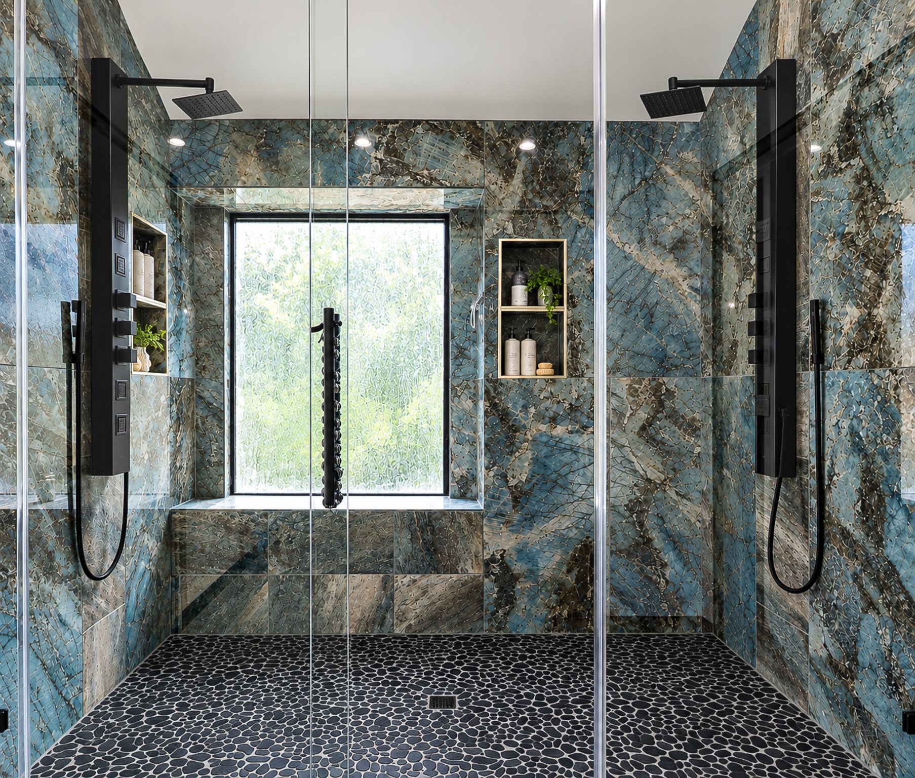 Primary bathroom shower. Double shower heads.