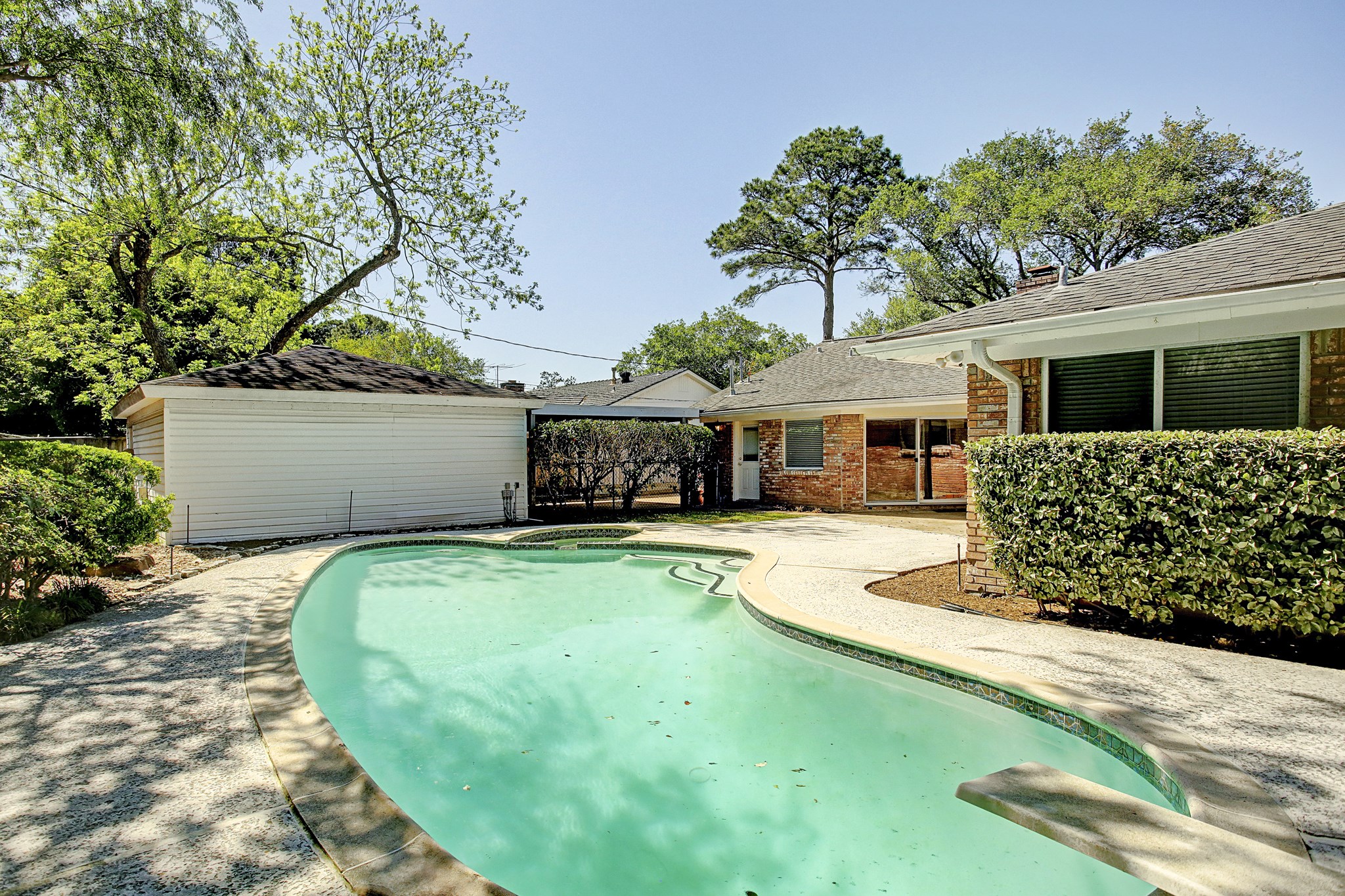 Good looks, deep roots. Classic brick, beautiful landscaping, and mature trees welcome you to this Parkwest lease, just blocks from Parker Elementary.