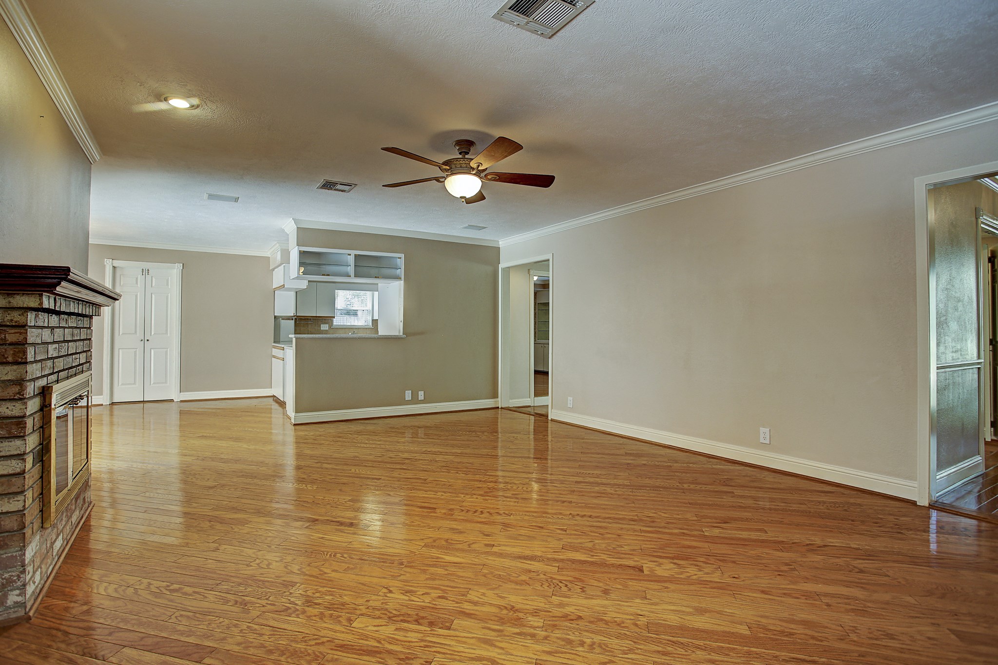 Room to arrange furniture around how you actually live, with easy connections to the kitchen, entry, and backyard.