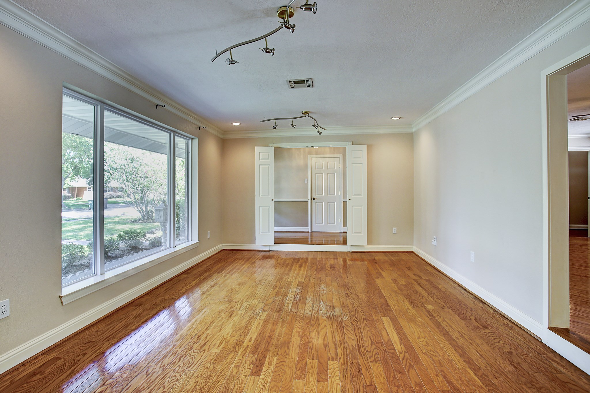 Big windows and hardwood floors set the scene. Bring the linen curtains, comfortable seating, and your own sense of style. Big windows and hardwood floors set the scene. Bring the linen curtains, comfortable seating, and your own sense of style.