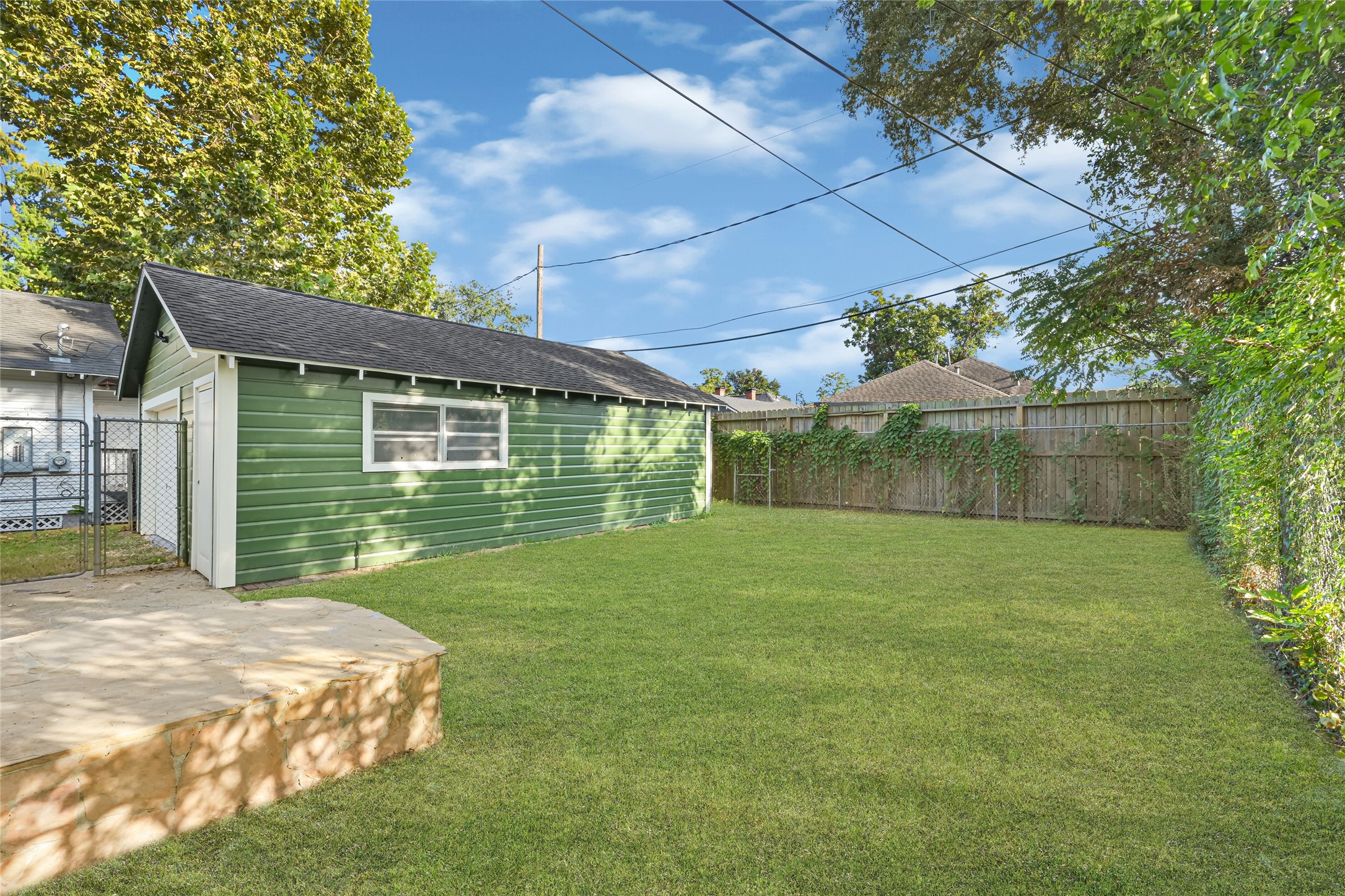 Back/side elevation with flagstone steps