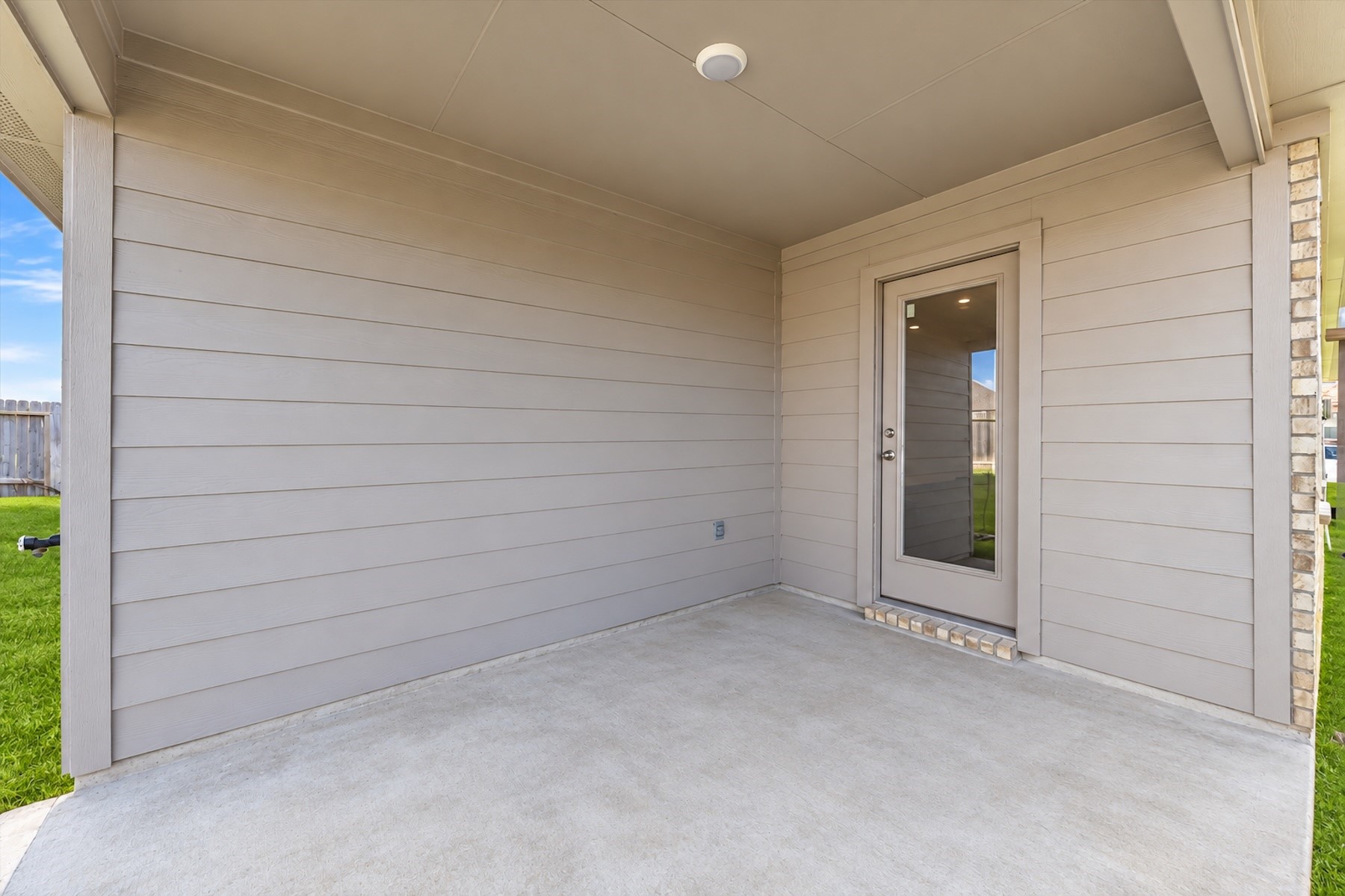 Outdoor living space ideal for morning coffee or evening gatherings.