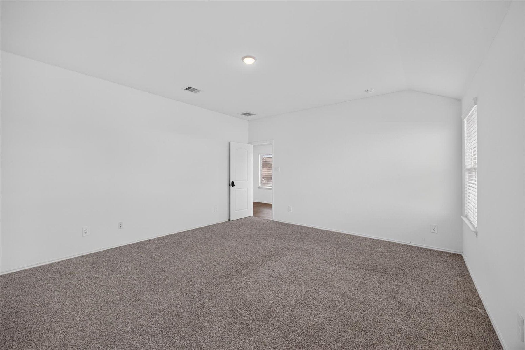 Another view of the primary suite.