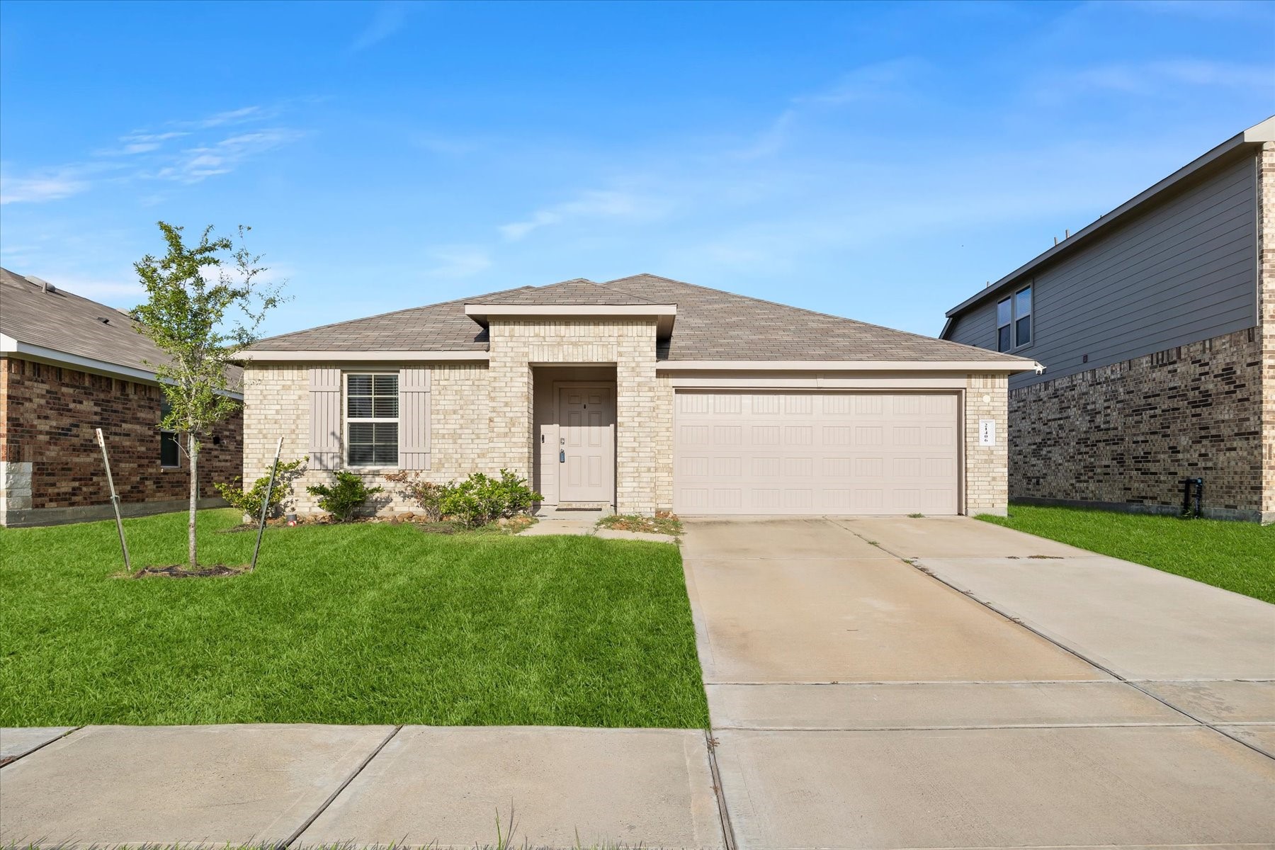 Beautiful brick exterior with inviting curb appeal.