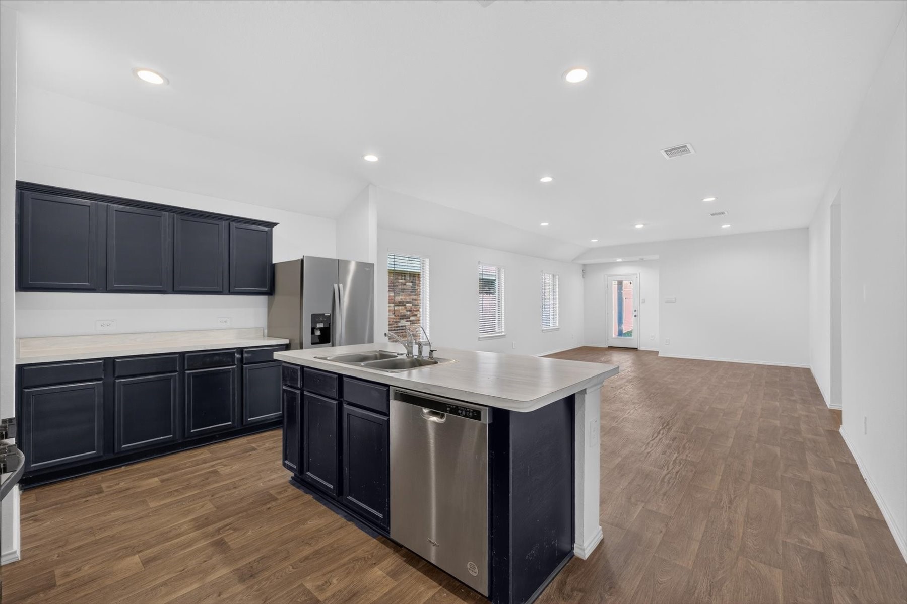 Kitchen opens seamlessly to the living area. Kitchen opens seamlessly to the living area.