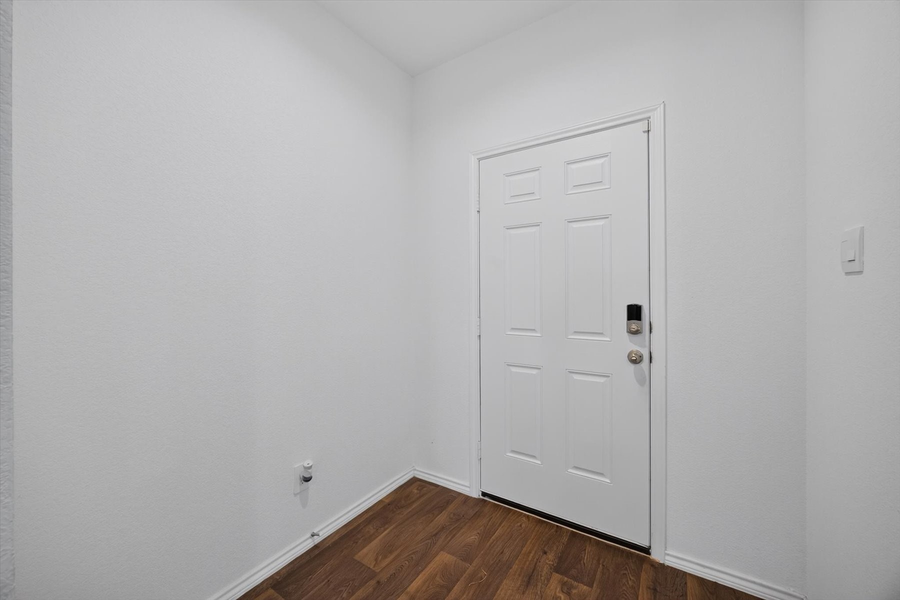 Inviting foyer with durable wood-look flooring. Inviting foyer with durable wood-look flooring.