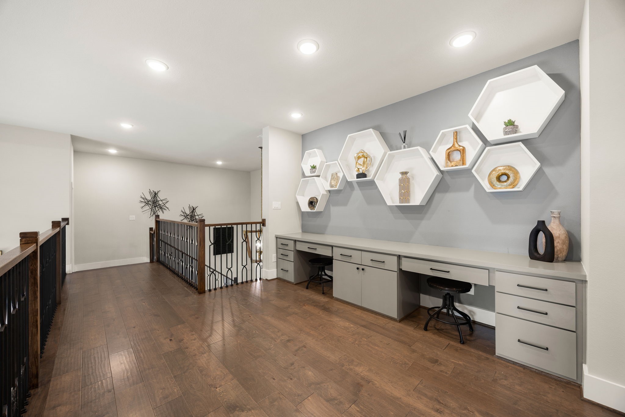 Spacious upstairs living area offering a versatile space for a game room, study area, or additional lounge.