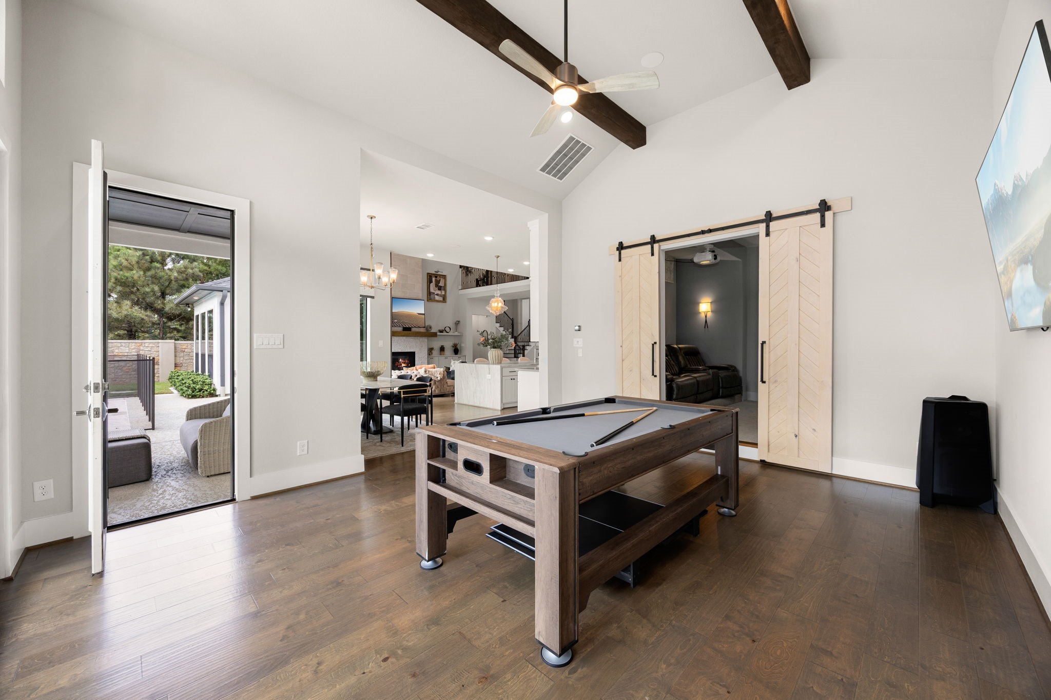 Versatile game room offering generous space for a pool table, games, or a secondary entertainment area.