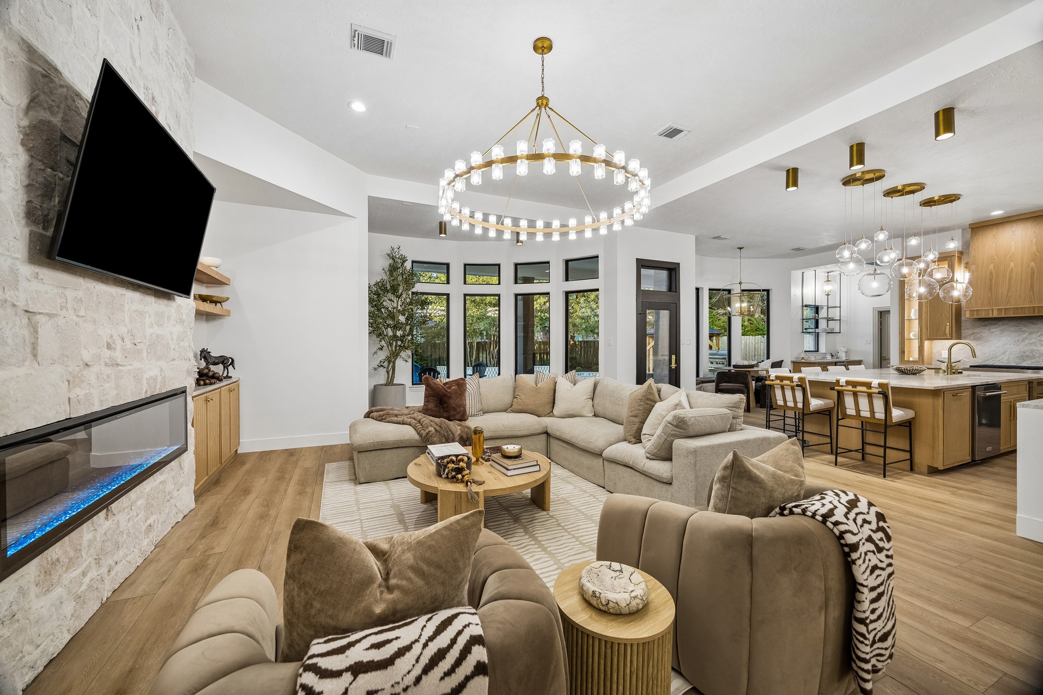 Living room anchored by the 72" electric fireplace
