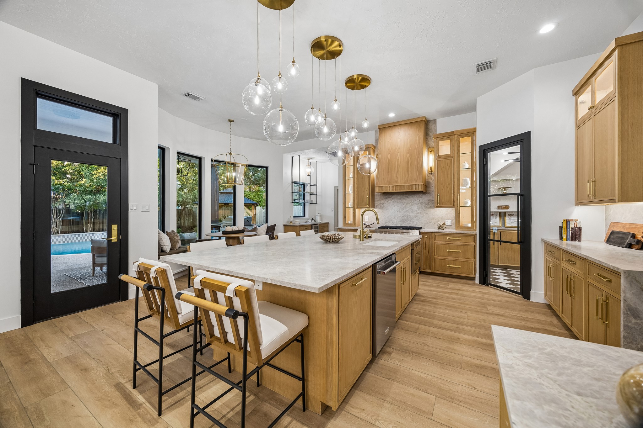 Huge island, white oak cabinets custom built, brand new luxury appliances!