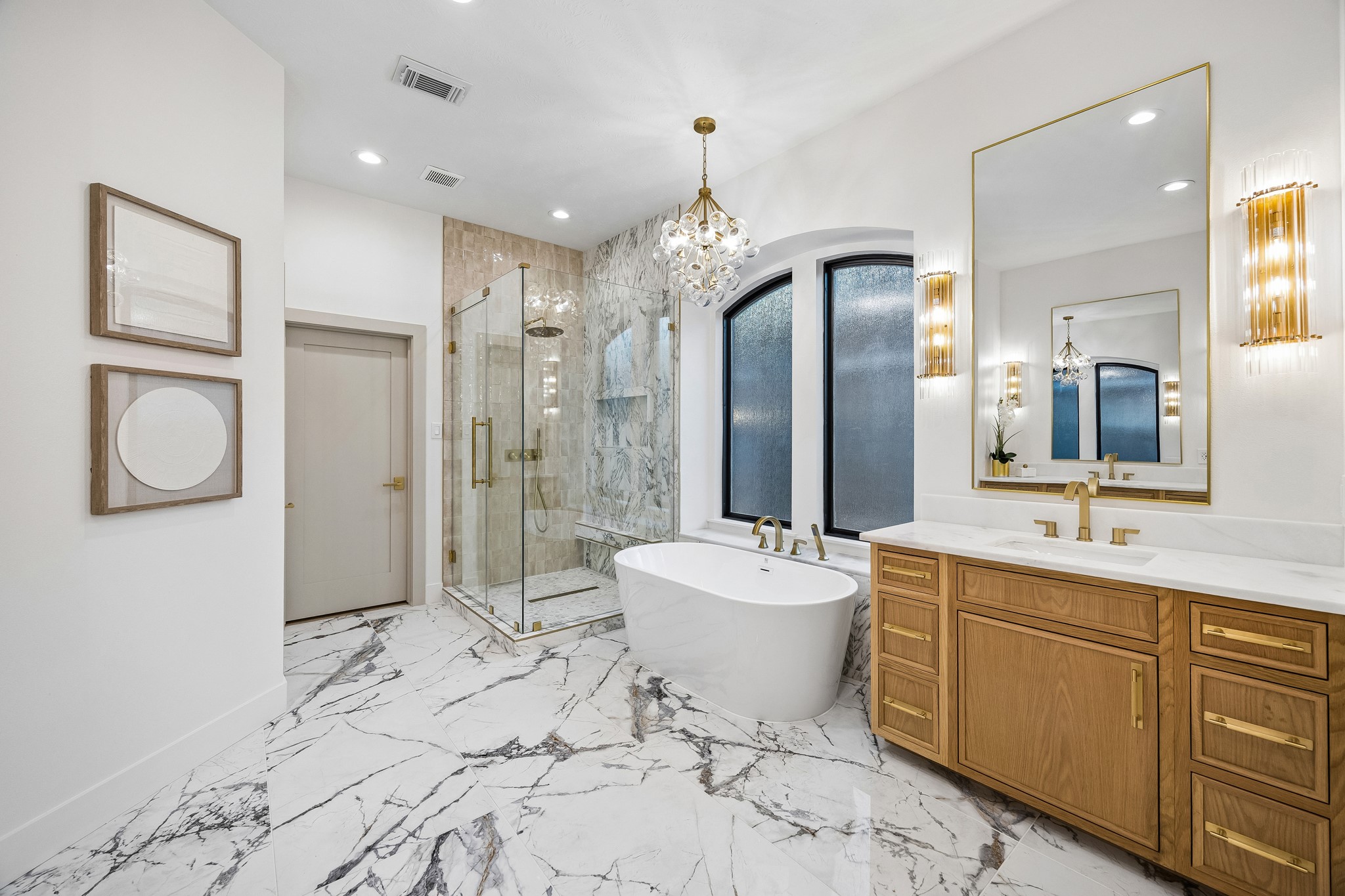 Primary bathroom is clean and modern