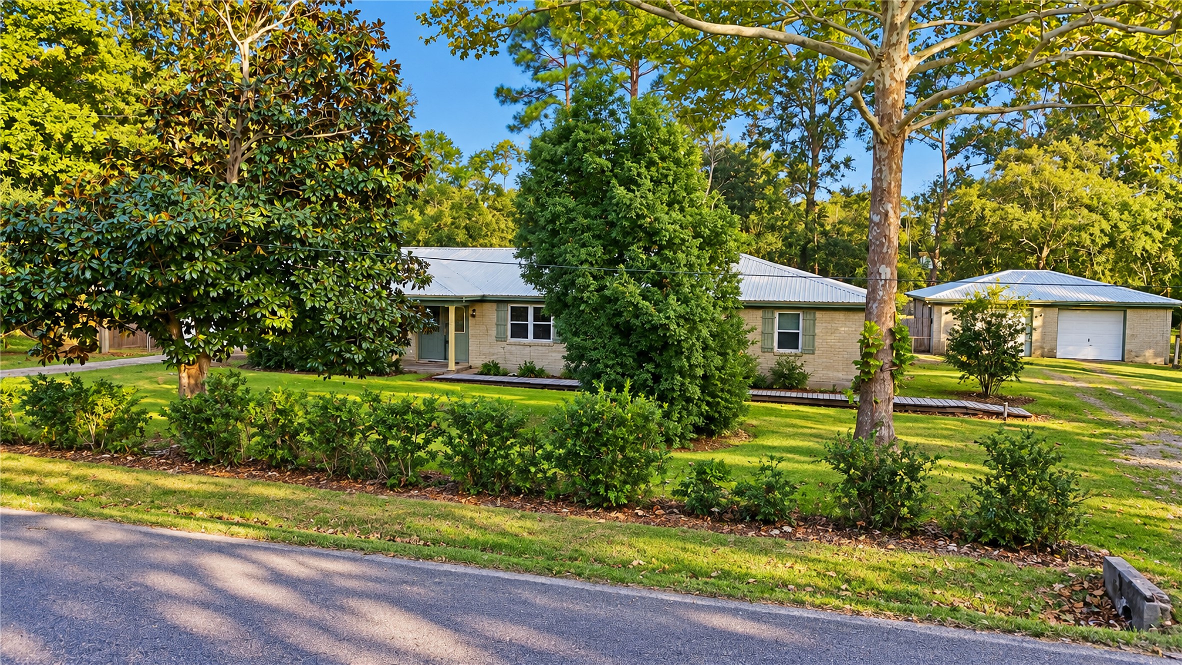 This four-bedroom 2 bath home sits on 1.8 Acres. 1 car attached garage and 2 car detached garage/workshop. This four-bedroom 2 bath home sits on 1.8 Acres. 1 car attached garage and 2 car detached garage/workshop.