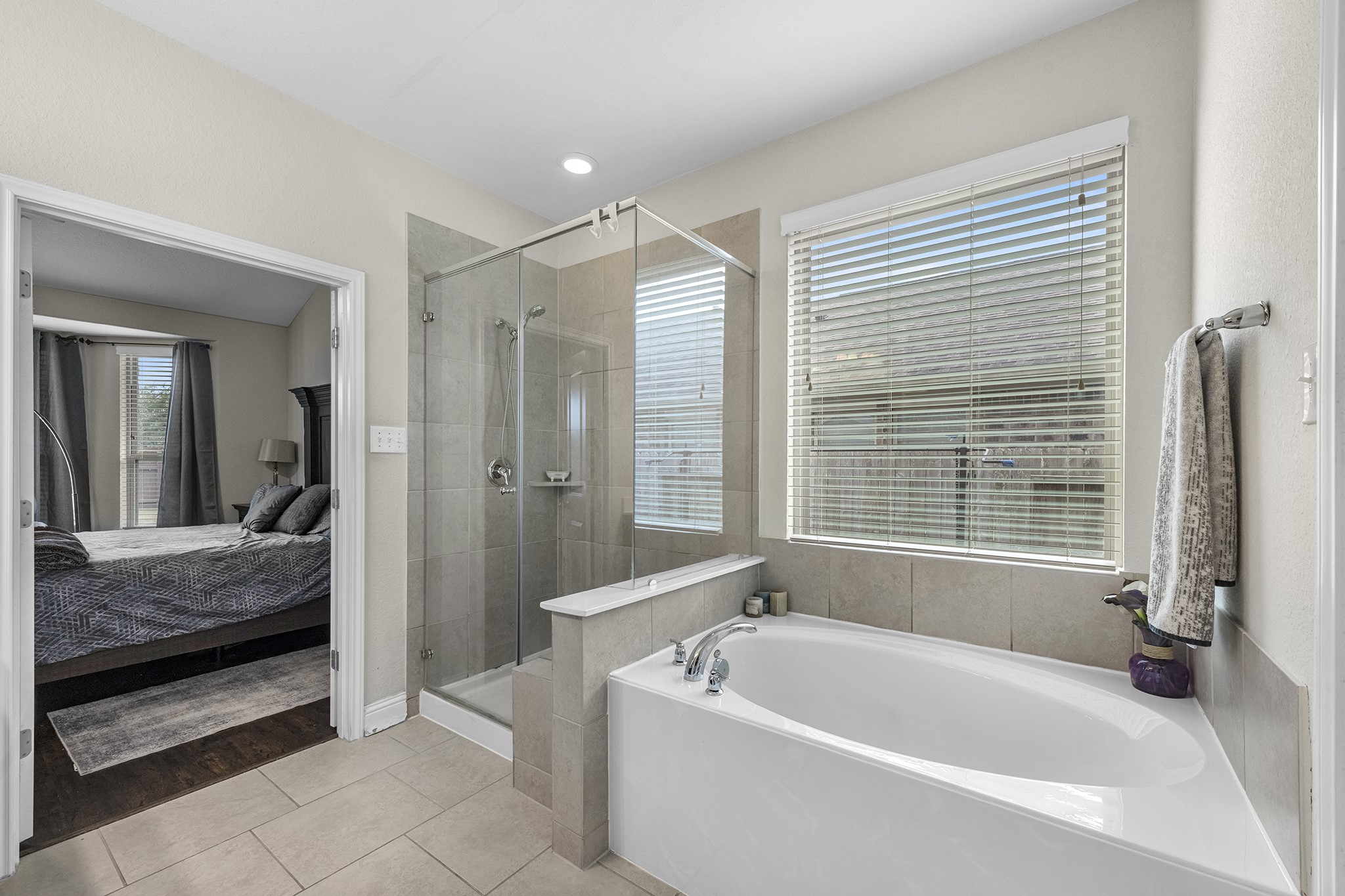 full bathroom with tub and shower