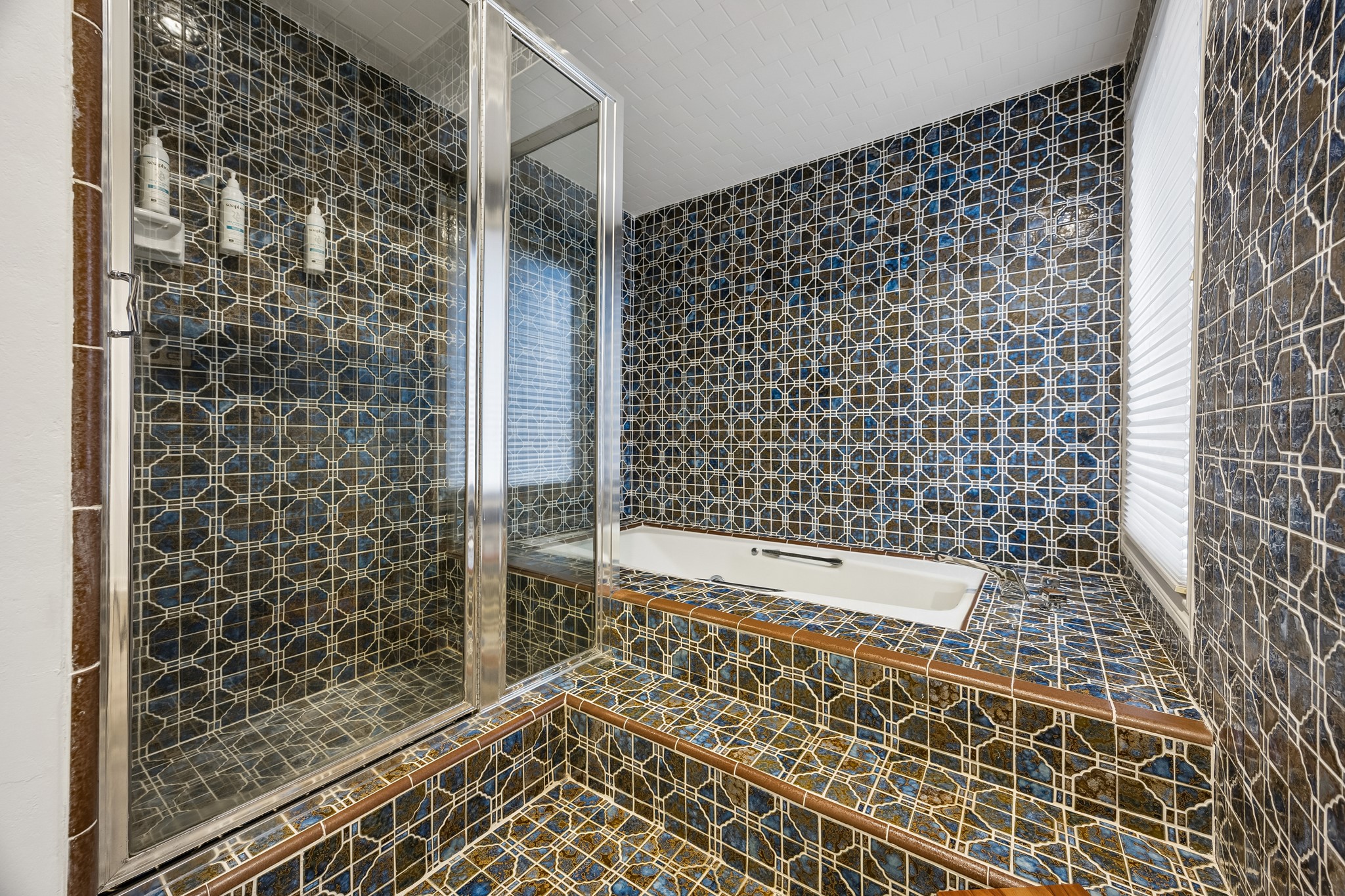 Primary retreat with soaking tub and shower.