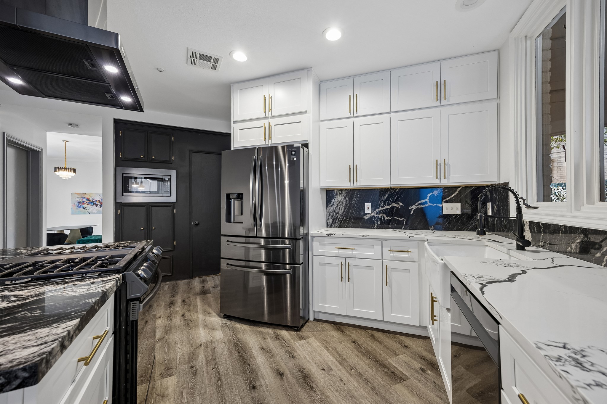 Chefs kitchen with gas stove.