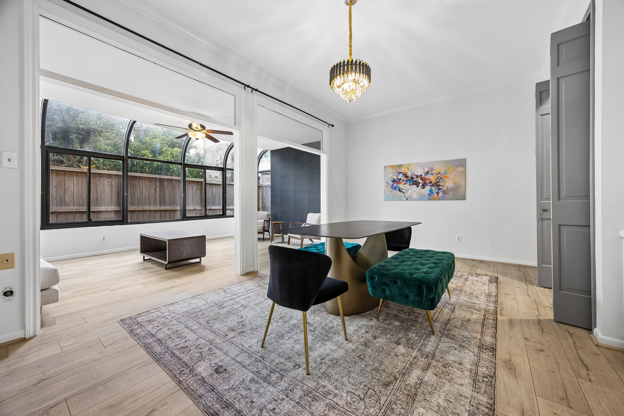 Formal dining room with sunroom retreat.