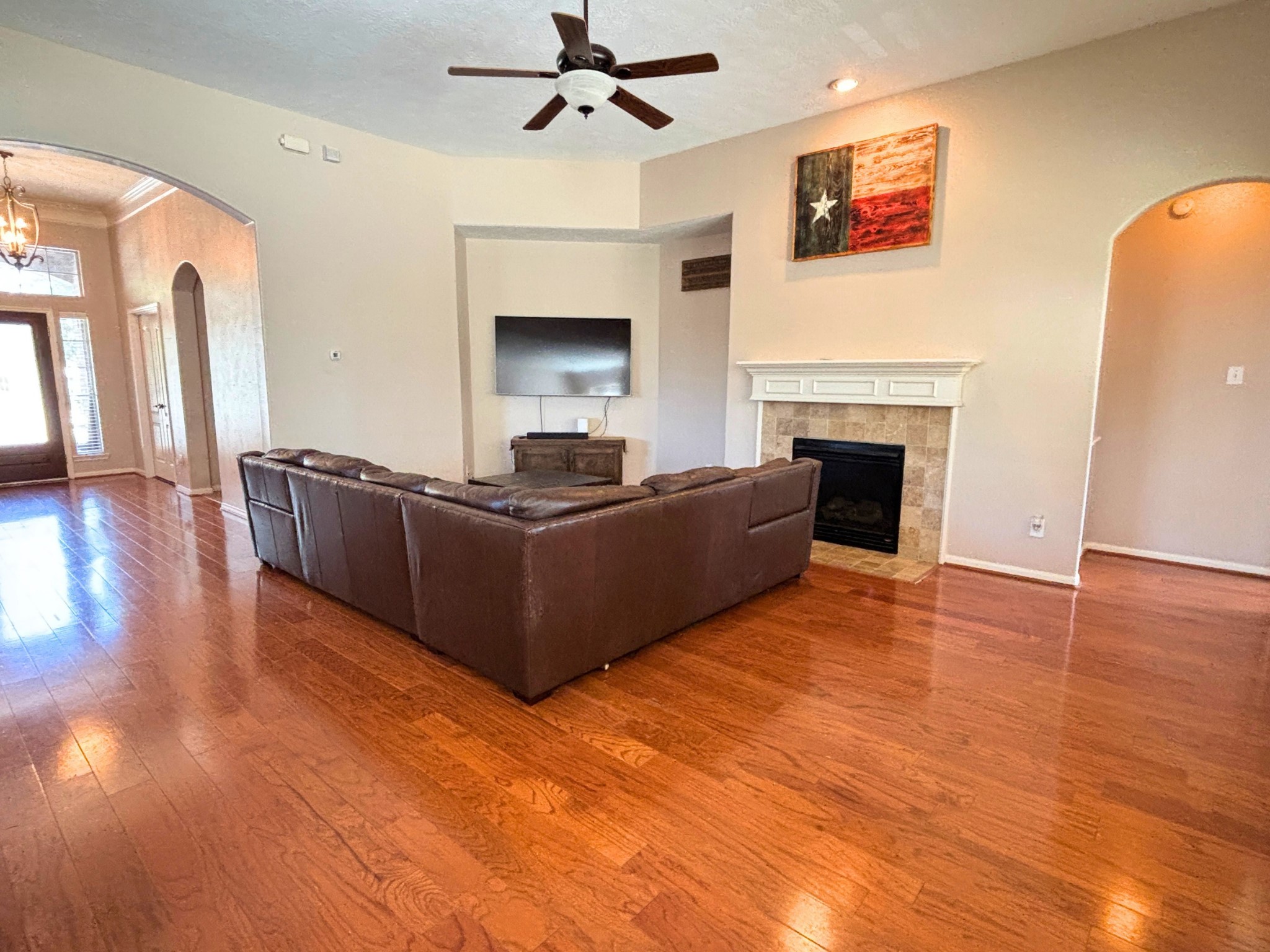 Grand entry features 11ft ceilings, crown molding, and architectural continuity.