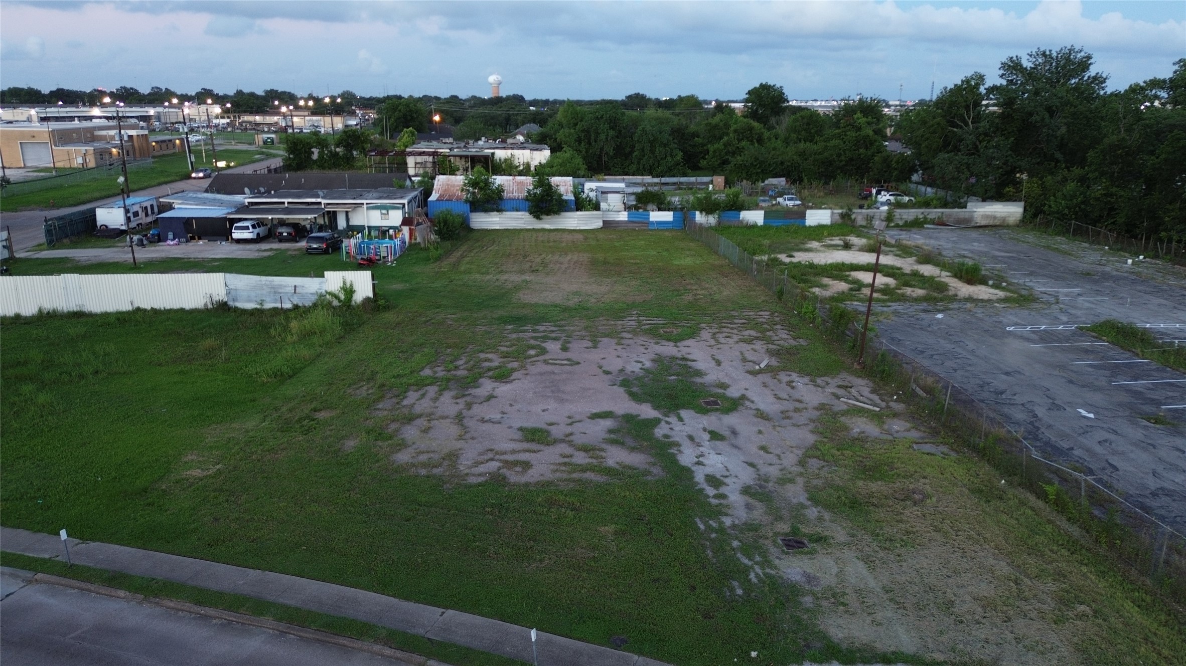 The Lot listed is where the grass is mowed at the edge of each side of the property