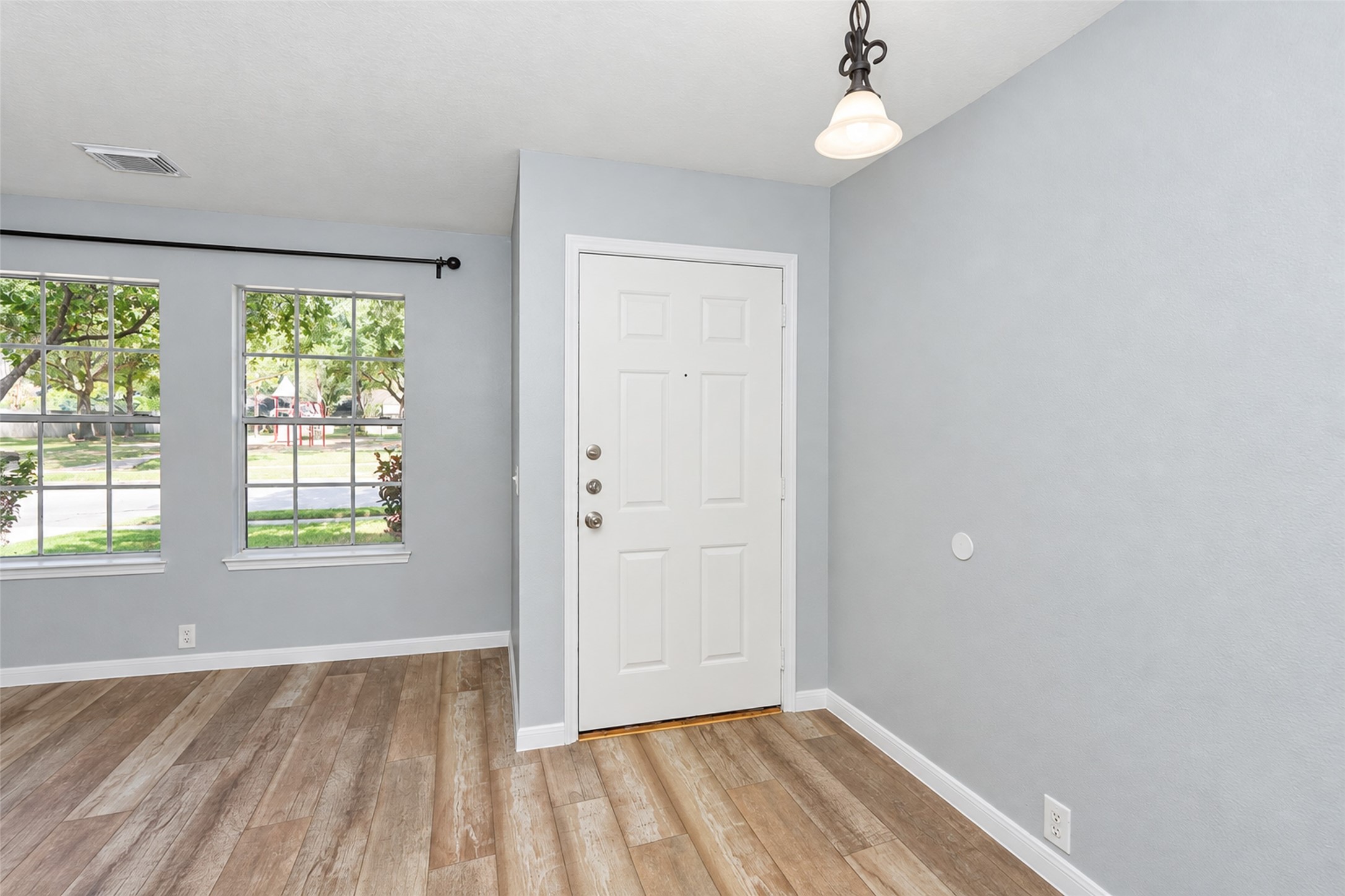 Bright entryway with natural light. Bright entryway with natural light.